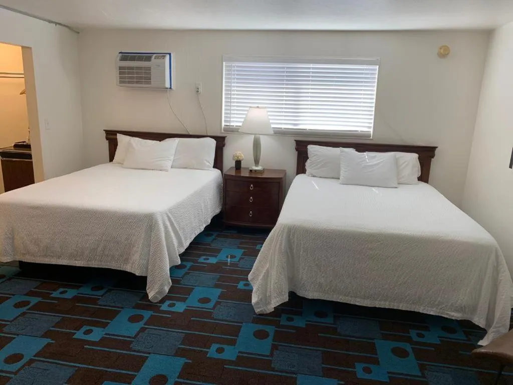 Bed in The Sands Motel