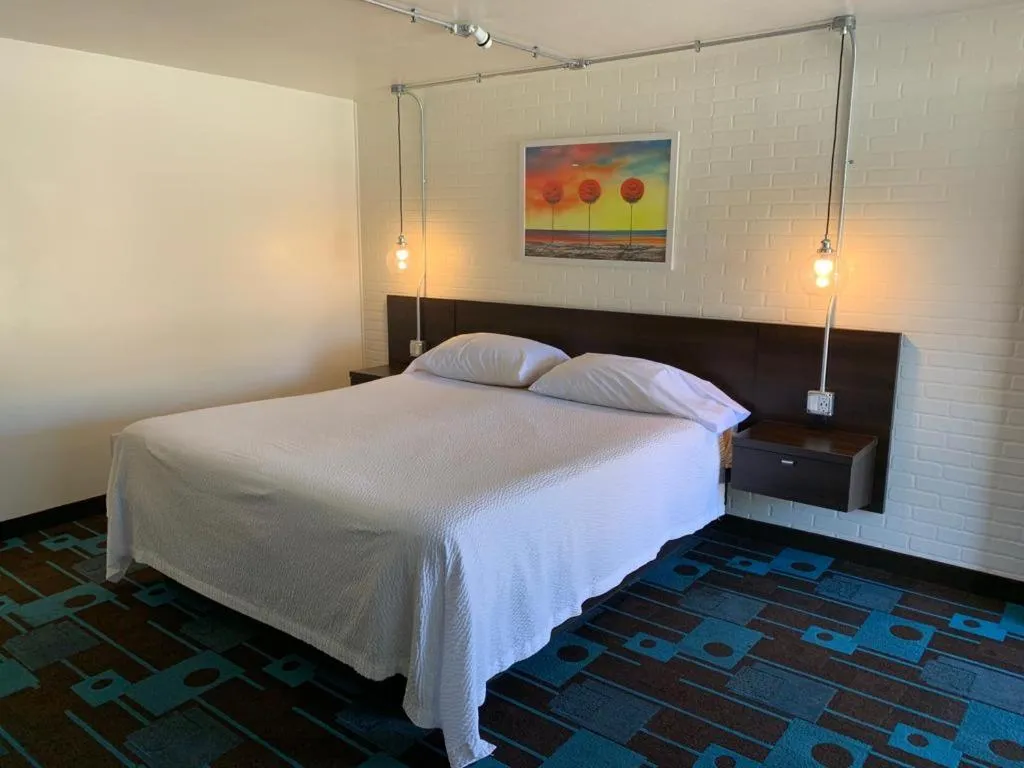 Bed in The Sands Motel