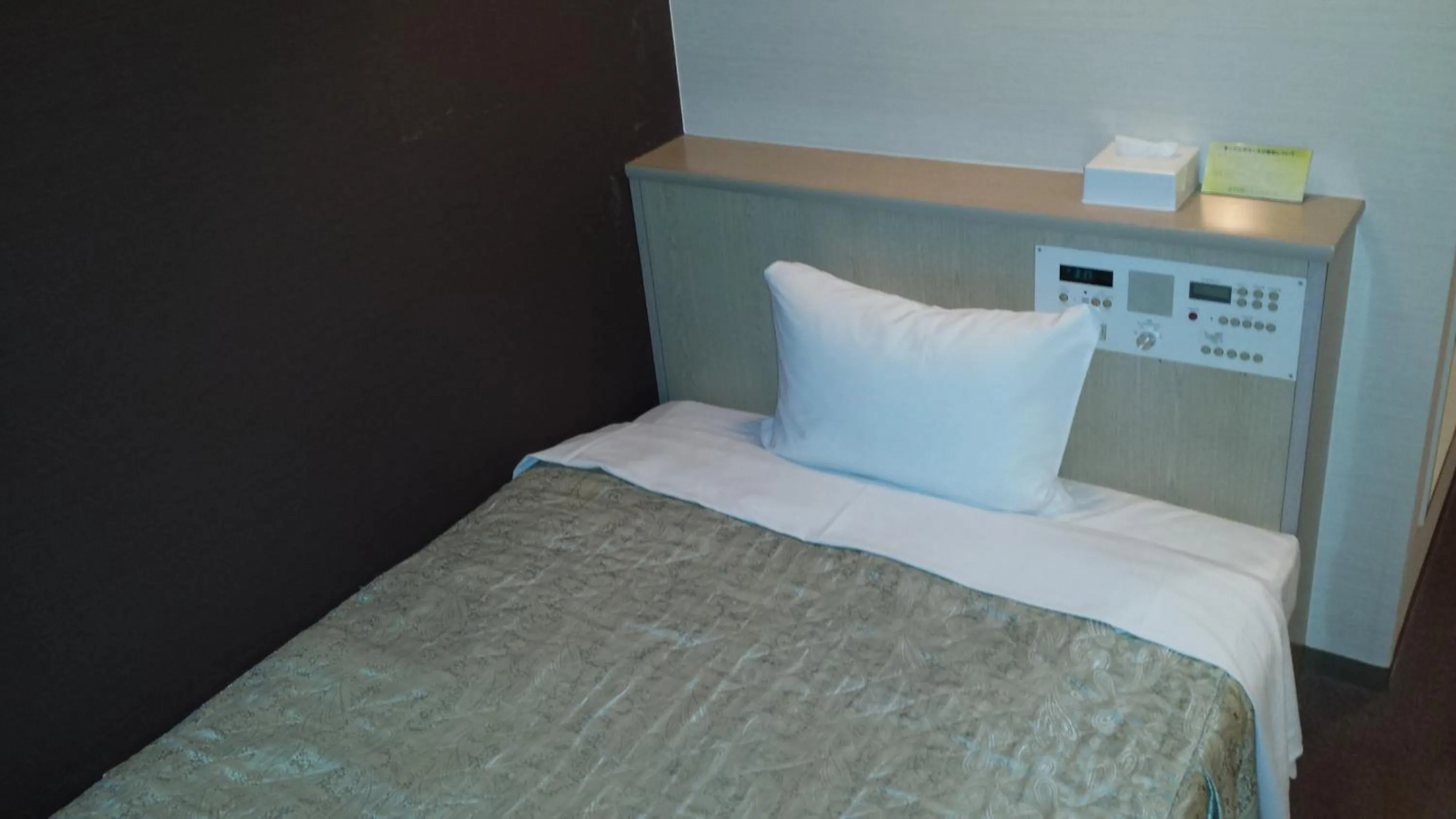 Bed in Uwajima Regent Hotel