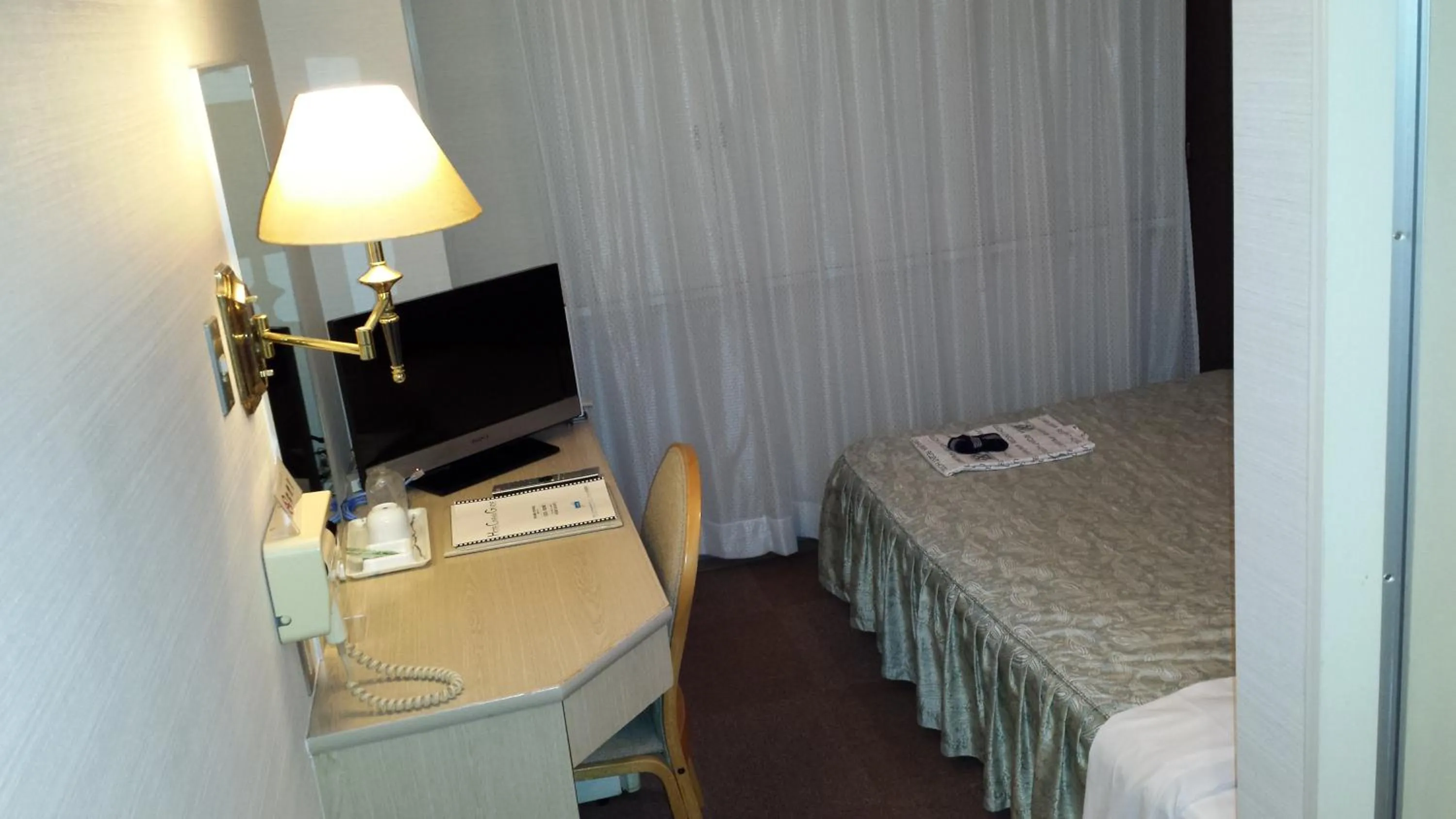 Photo of the whole room, Bed in Uwajima Regent Hotel