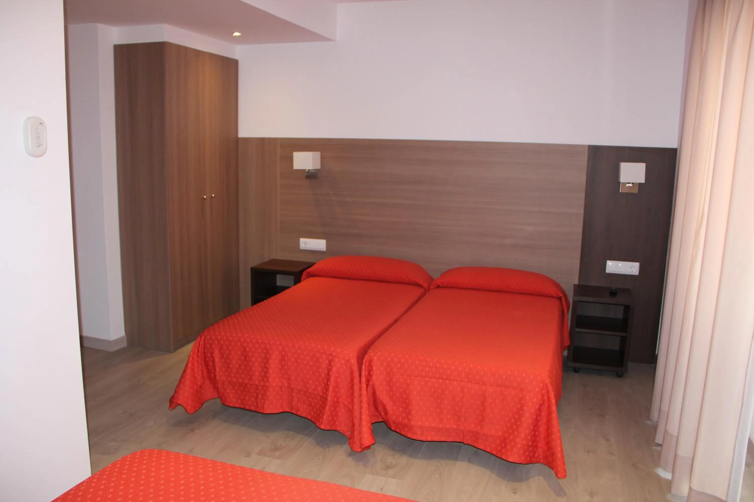 Bed in Hotel Victoria