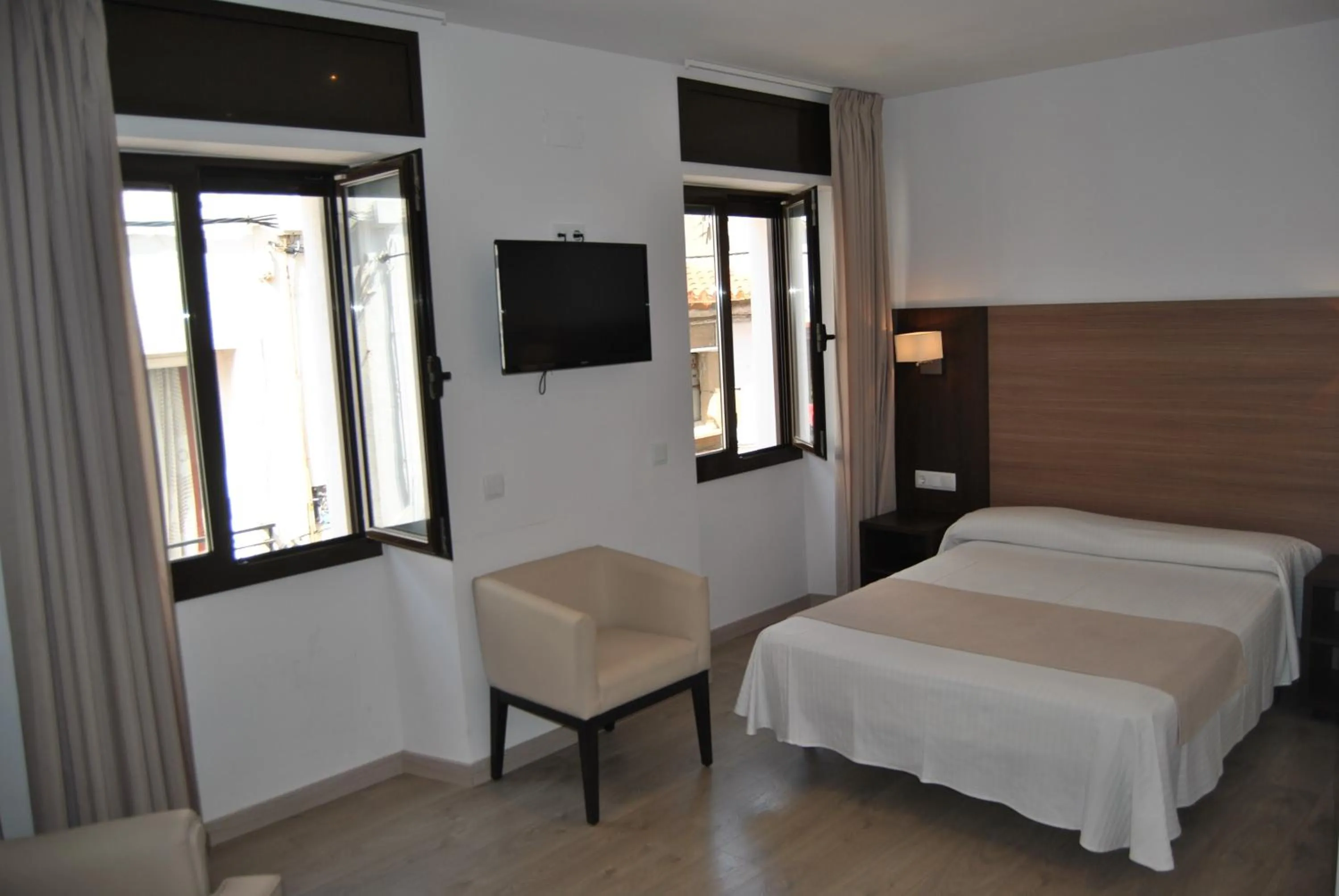 Bed in Hotel Victoria