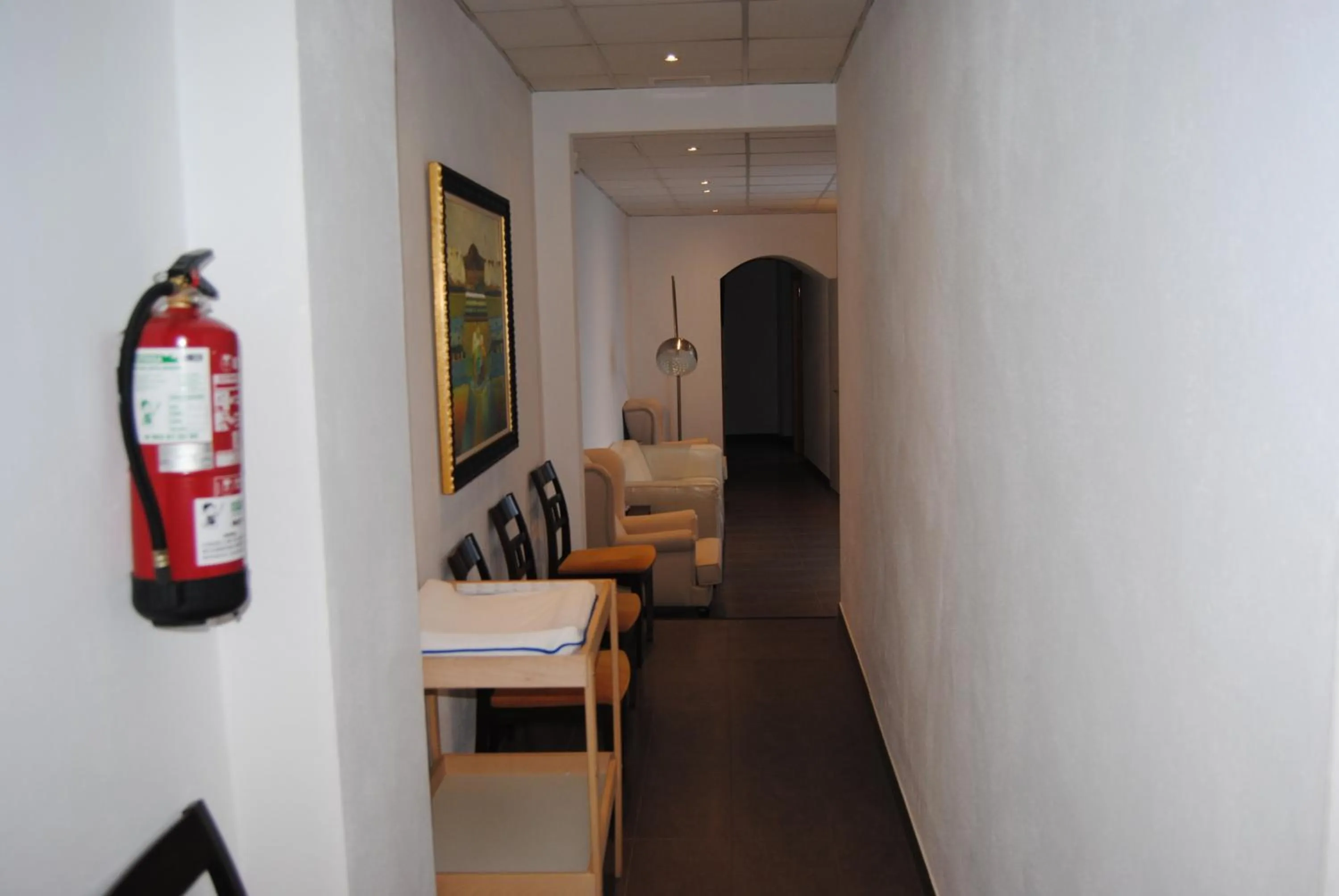 Communal lounge/ TV room in Hotel Victoria