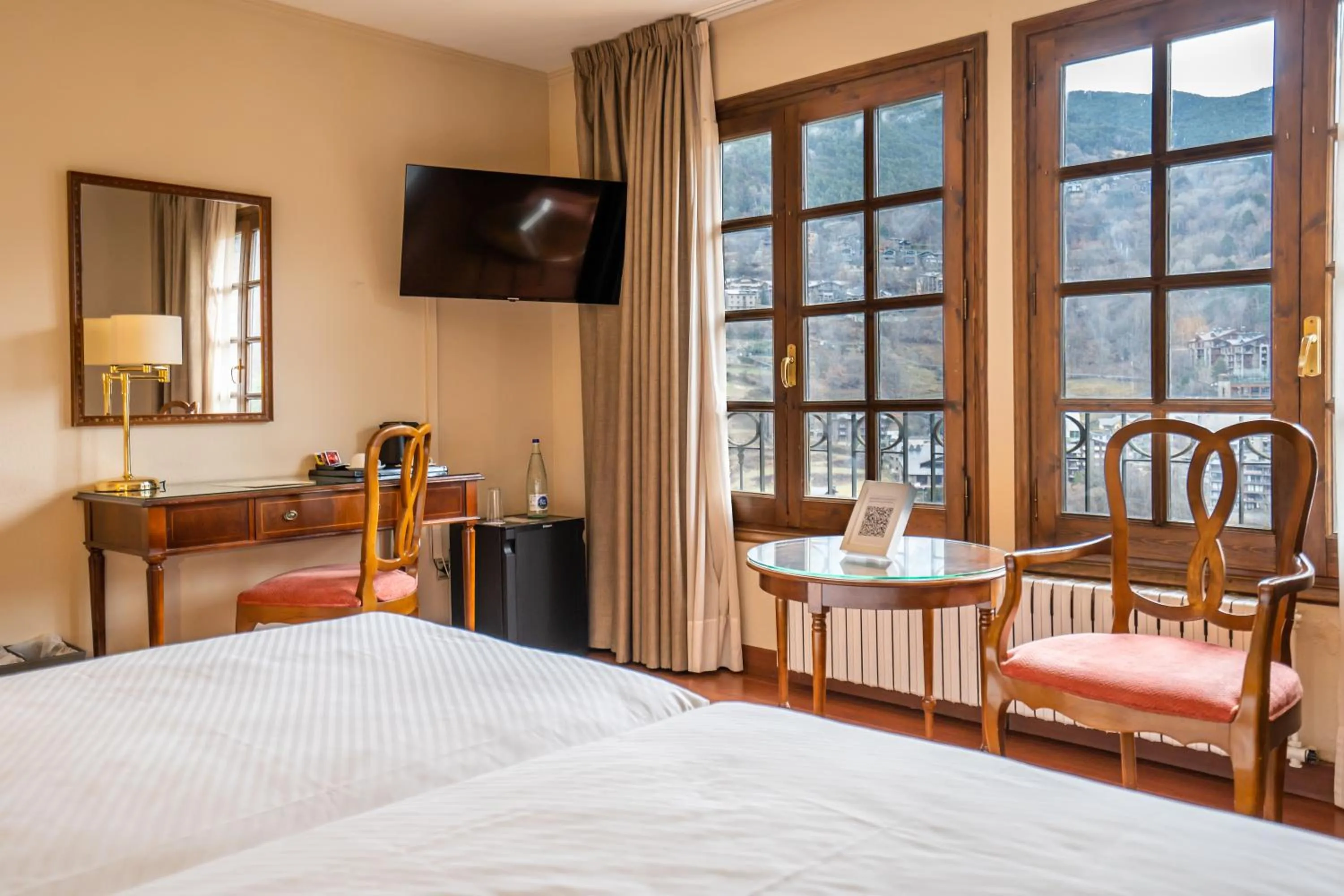 Seating area, Bed in Abba Xalet Suites Hotel