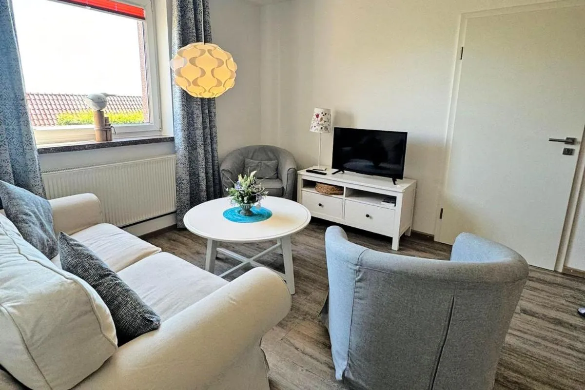 Communal lounge/ TV room in Ferienwohnung Boddenzander