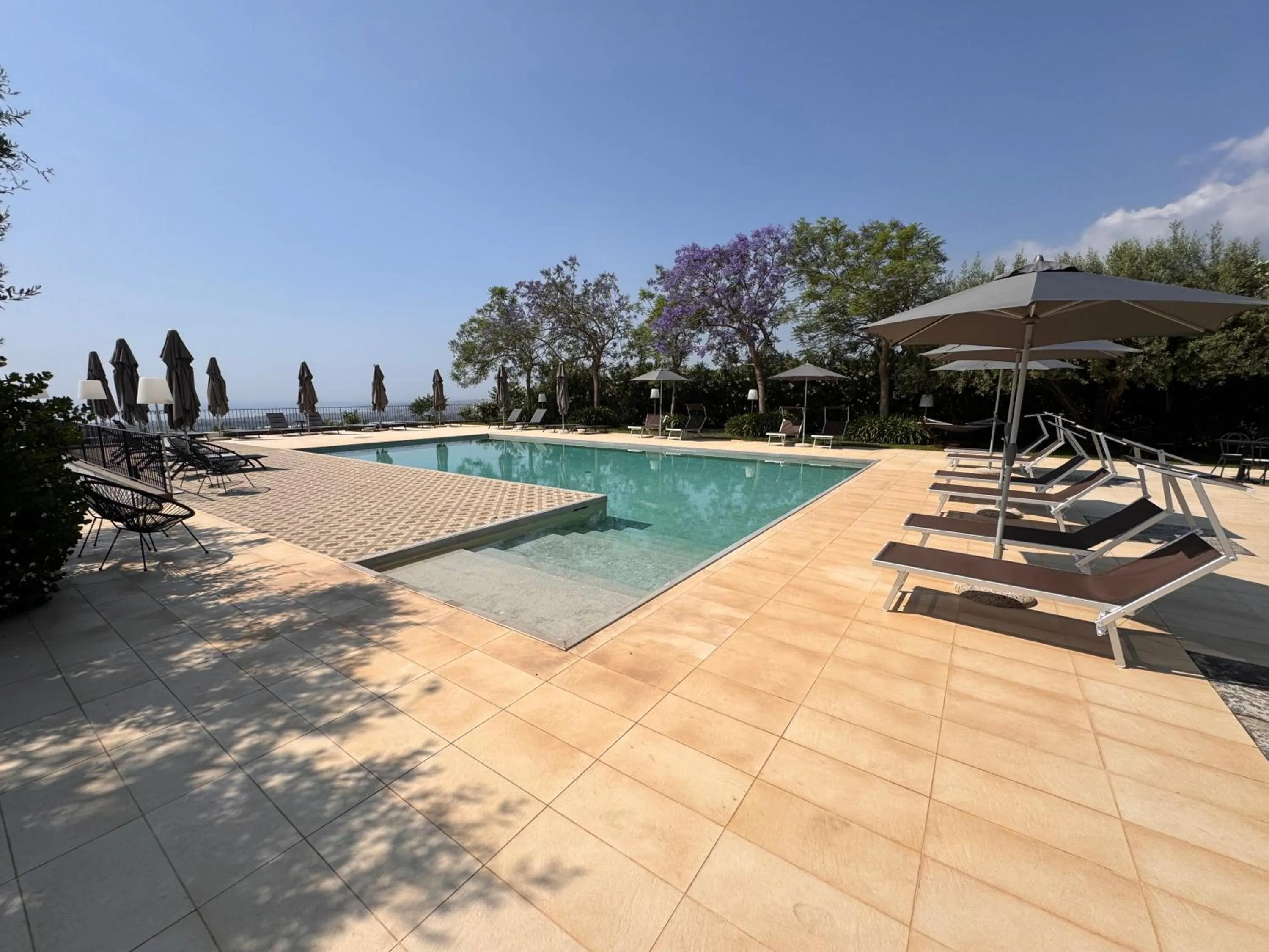 Swimming pool in Talè Restaurant & Suite