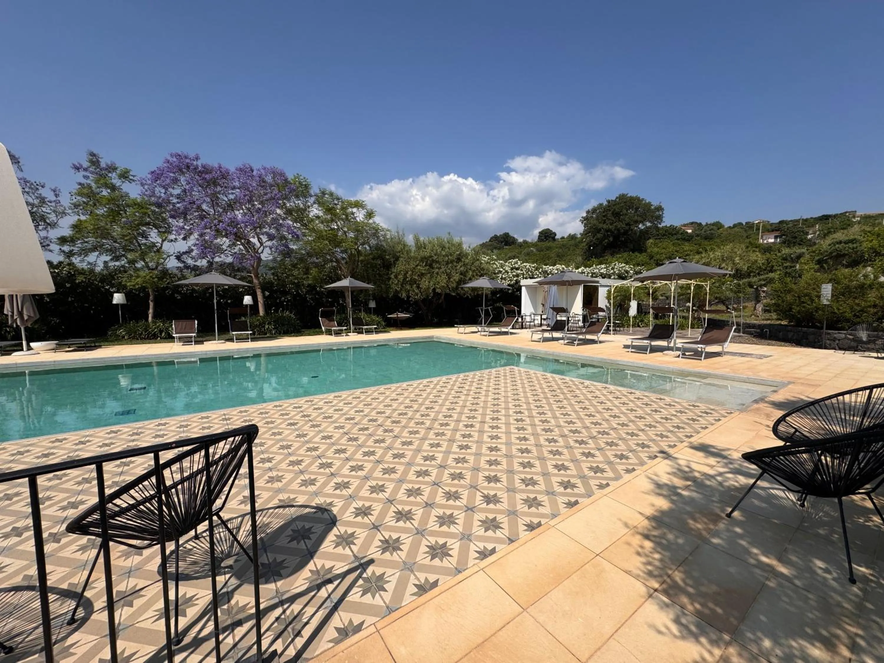 Swimming pool in Talè Restaurant & Suite