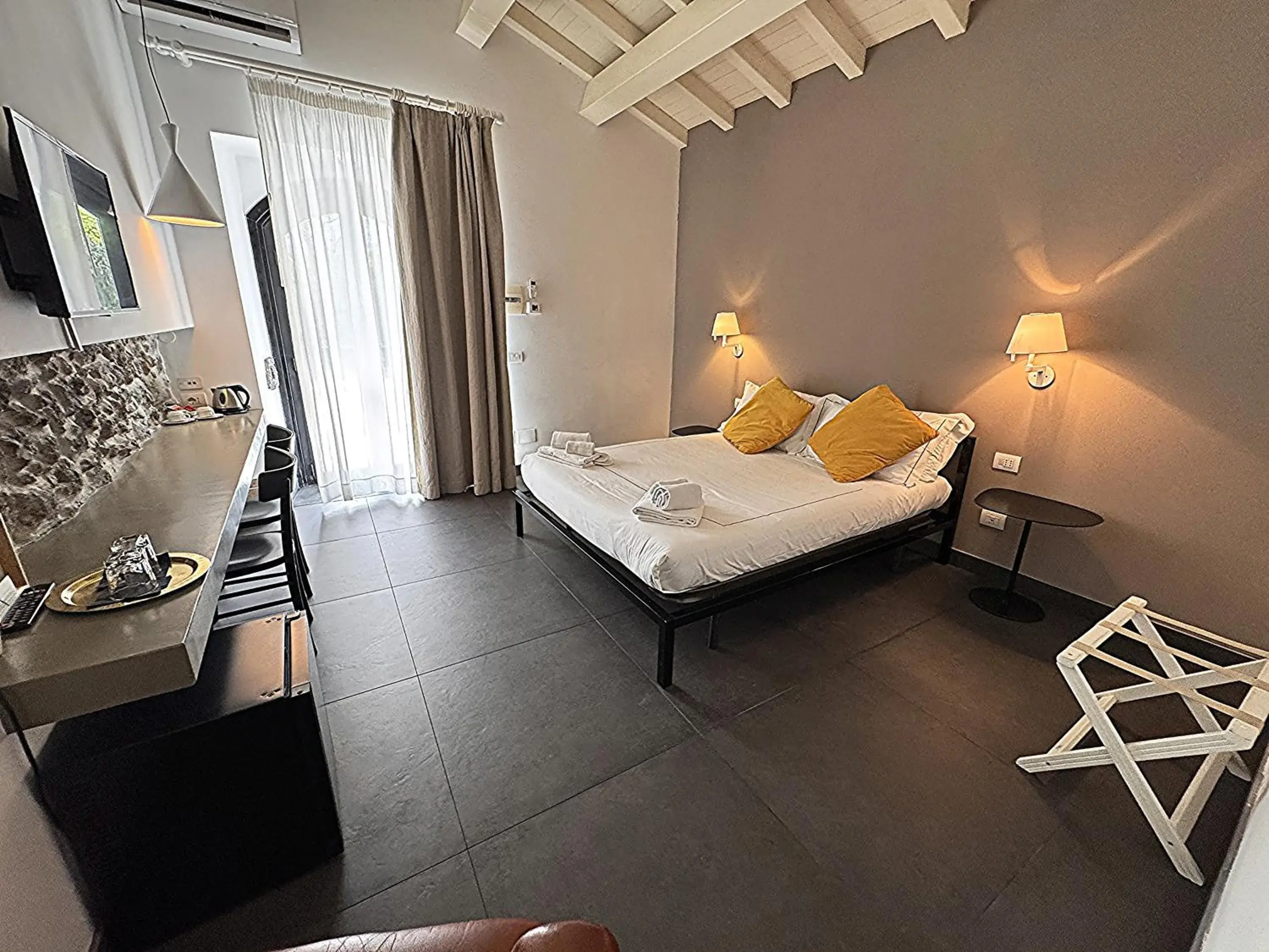 Bed in Talè Restaurant & Suite Bed in Talè Restaurant & Suite