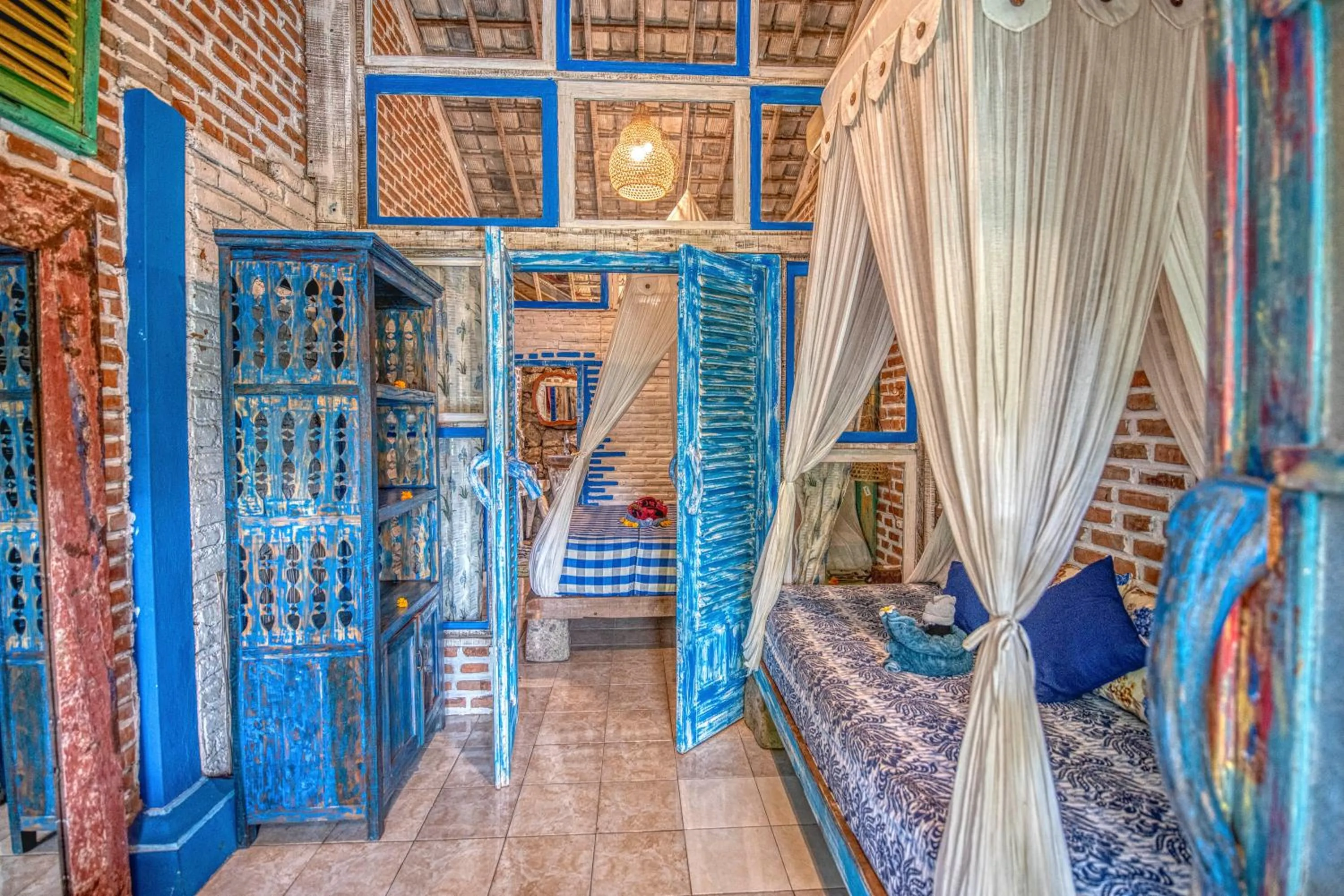 Photo of the whole room, Bed in Santhiku Hotel & SPA