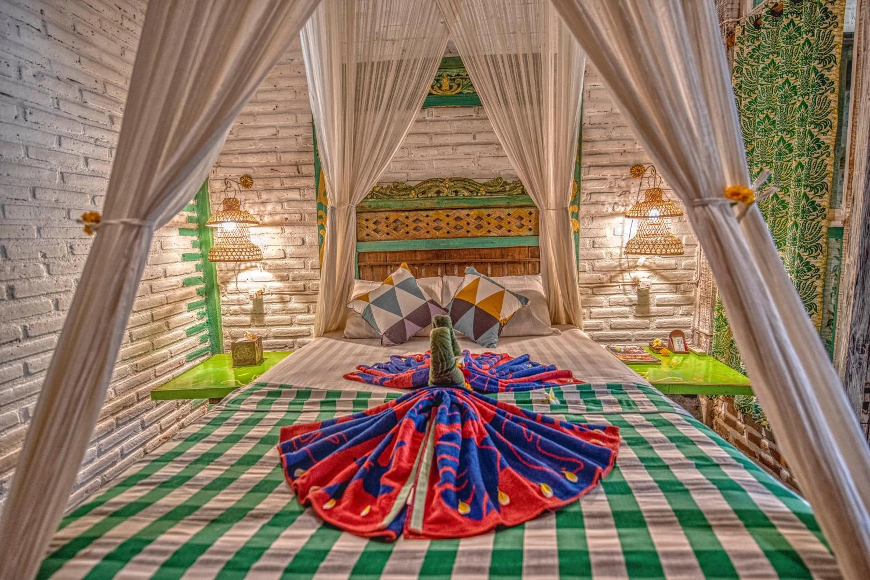 Bed in Santhiku Hotel & SPA