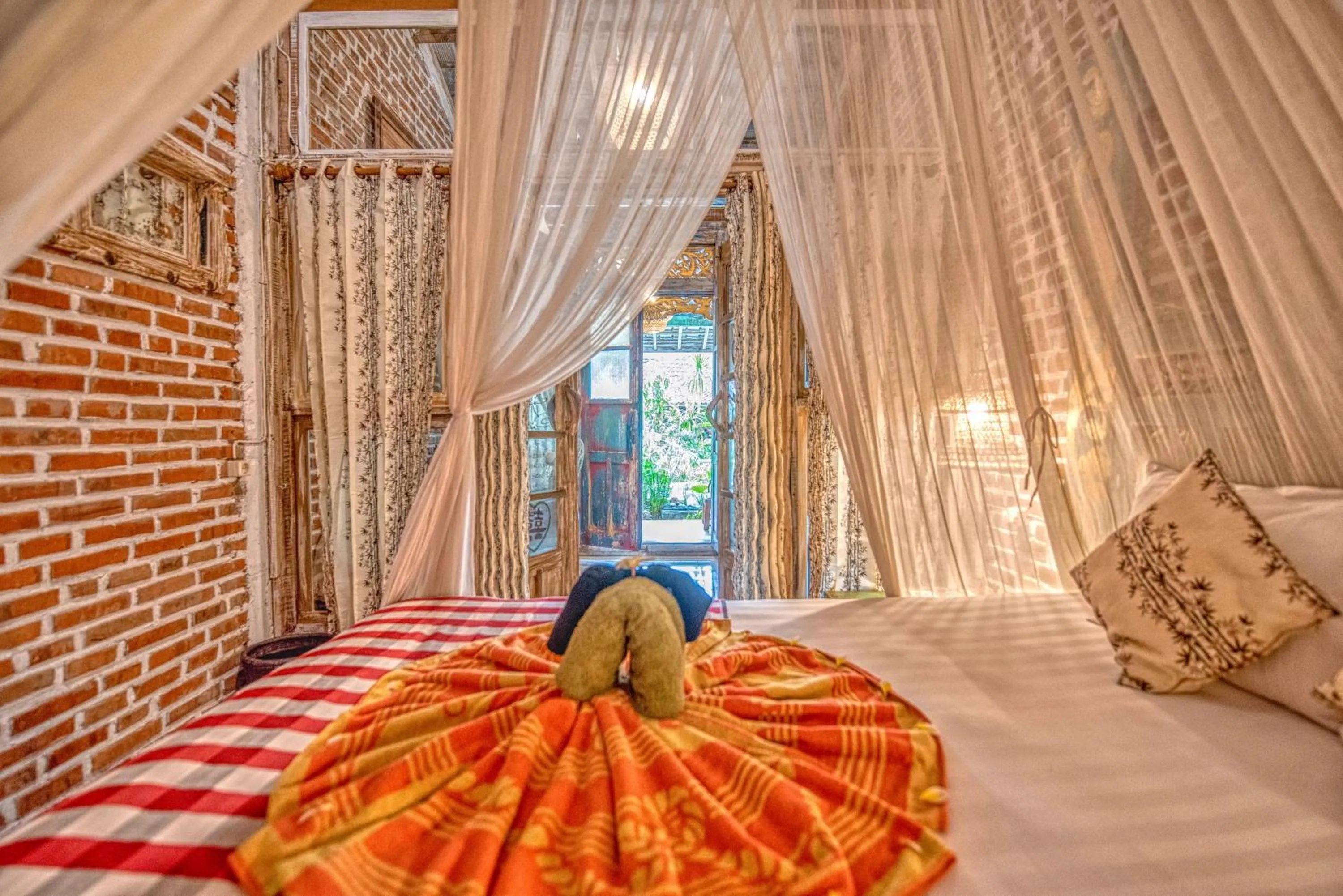 Bed in Santhiku Hotel & SPA