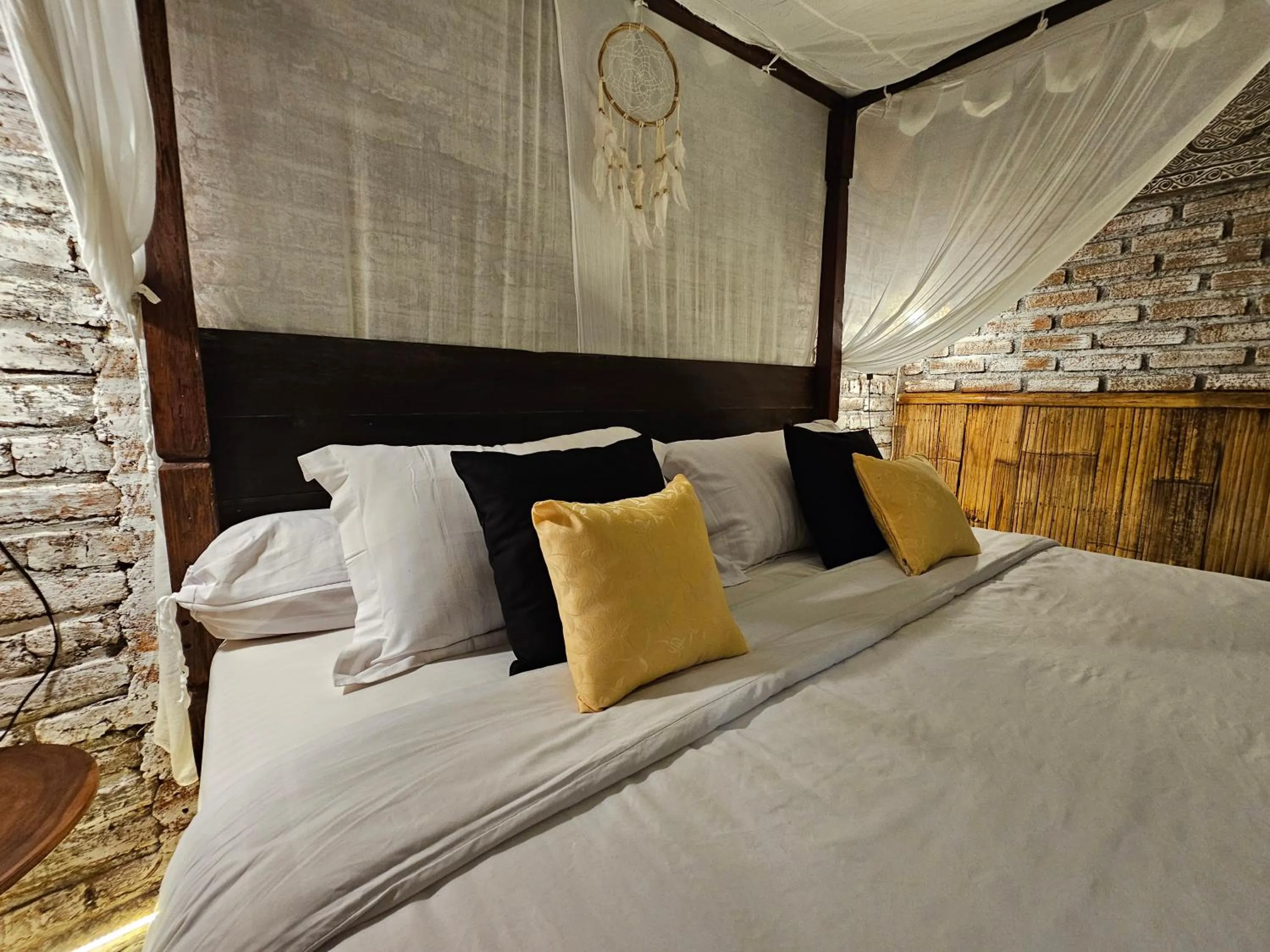 Bed in Santhiku Hotel & SPA