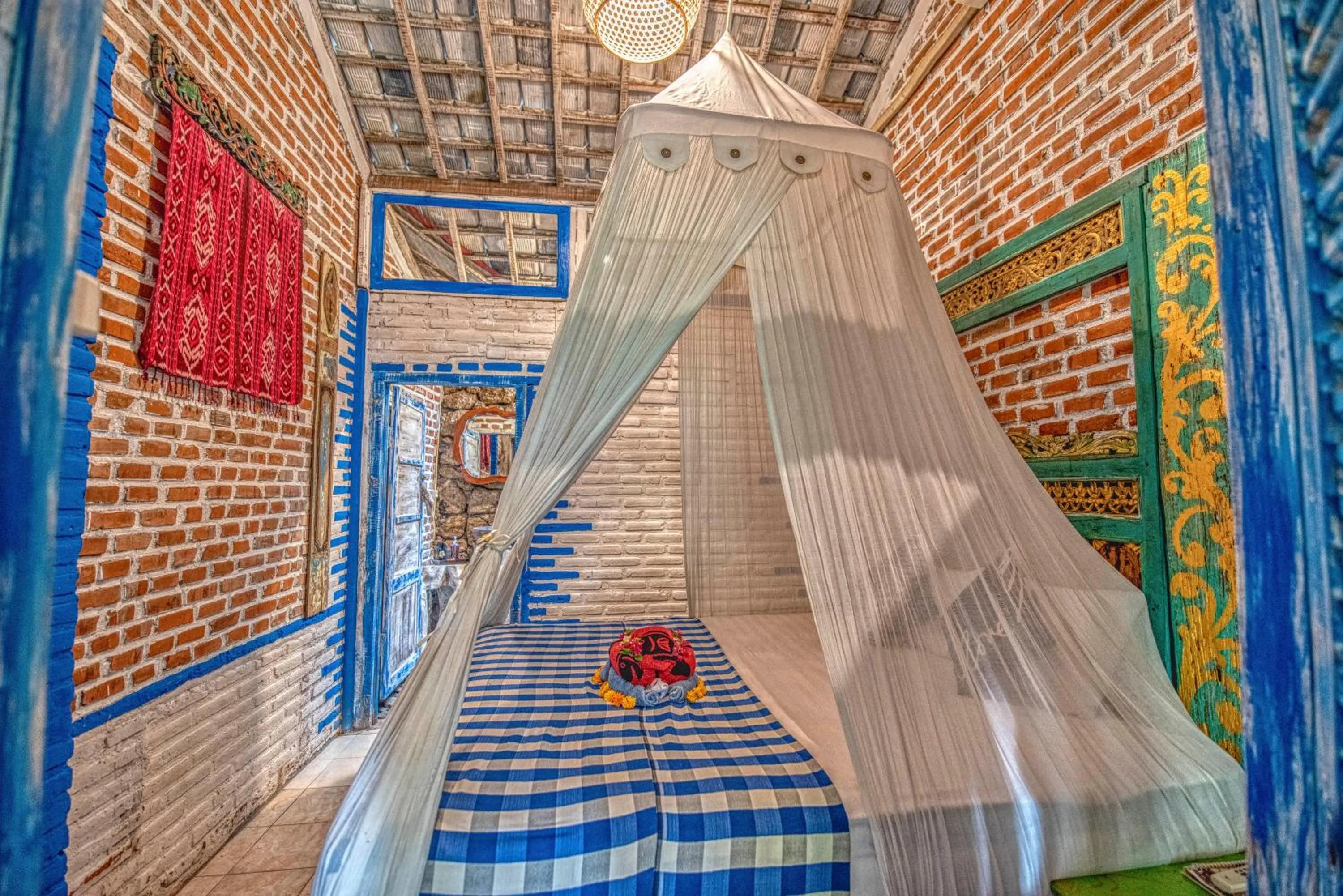 Bed in Santhiku Hotel & SPA