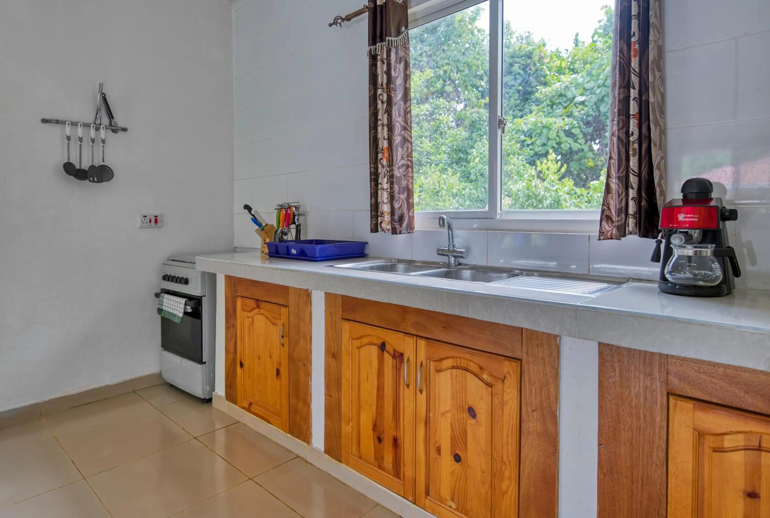 Kitchen or kitchenette in Alha Villa