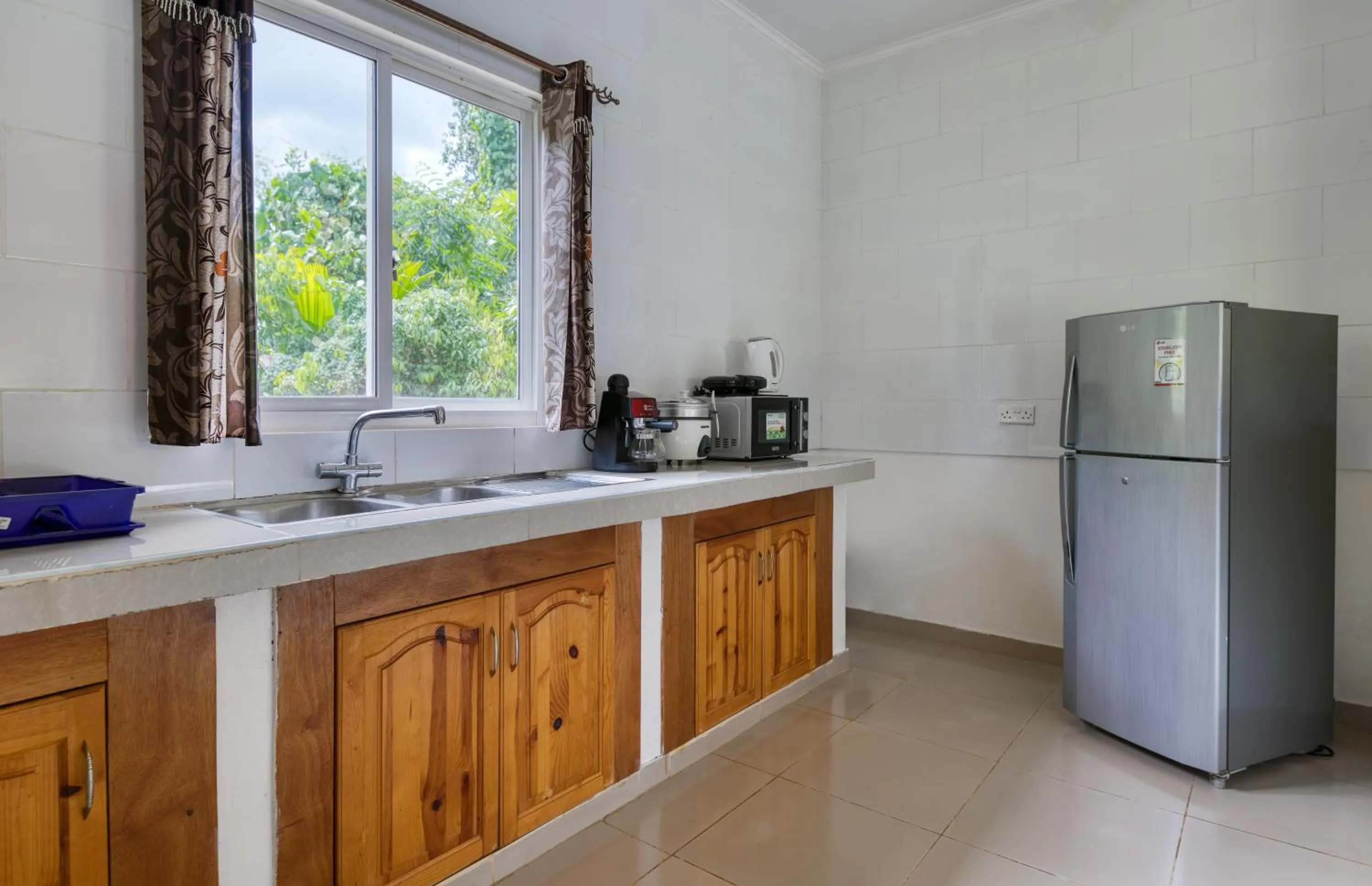Kitchen or kitchenette in Alha Villa