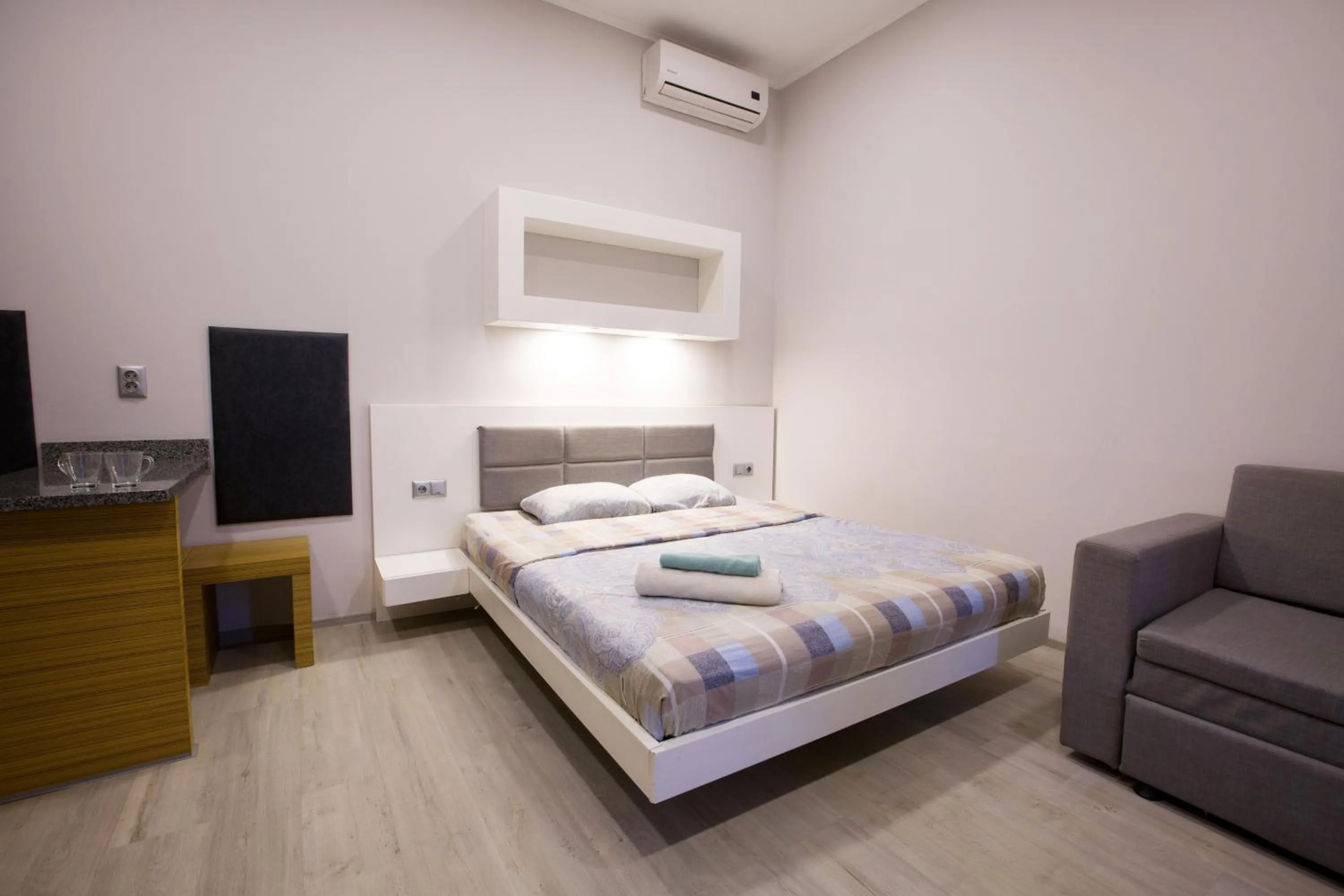 Photo of the whole room, Bed in Pushkinskaya Apartments