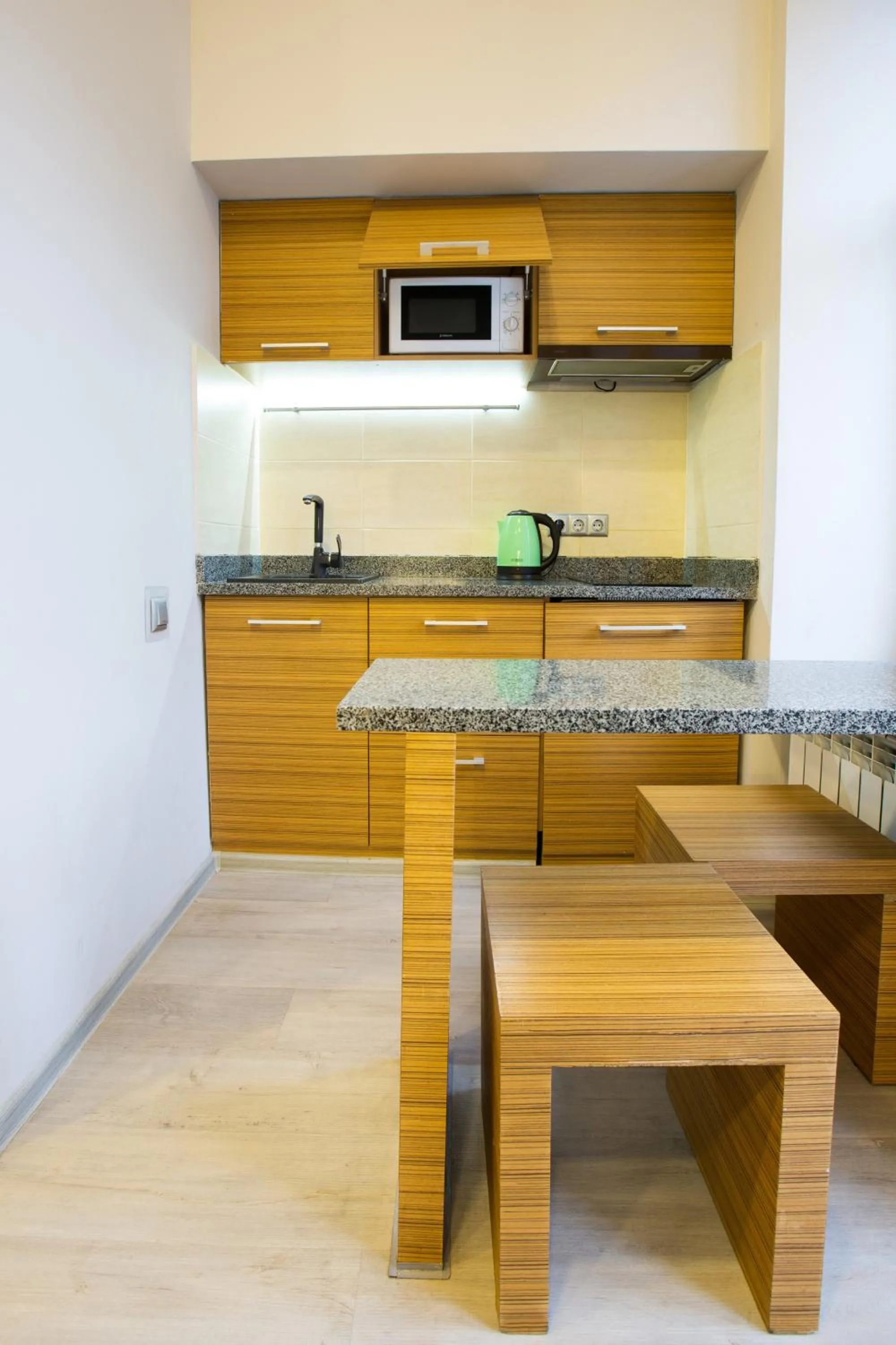 Kitchen or kitchenette in Pushkinskaya Apartments