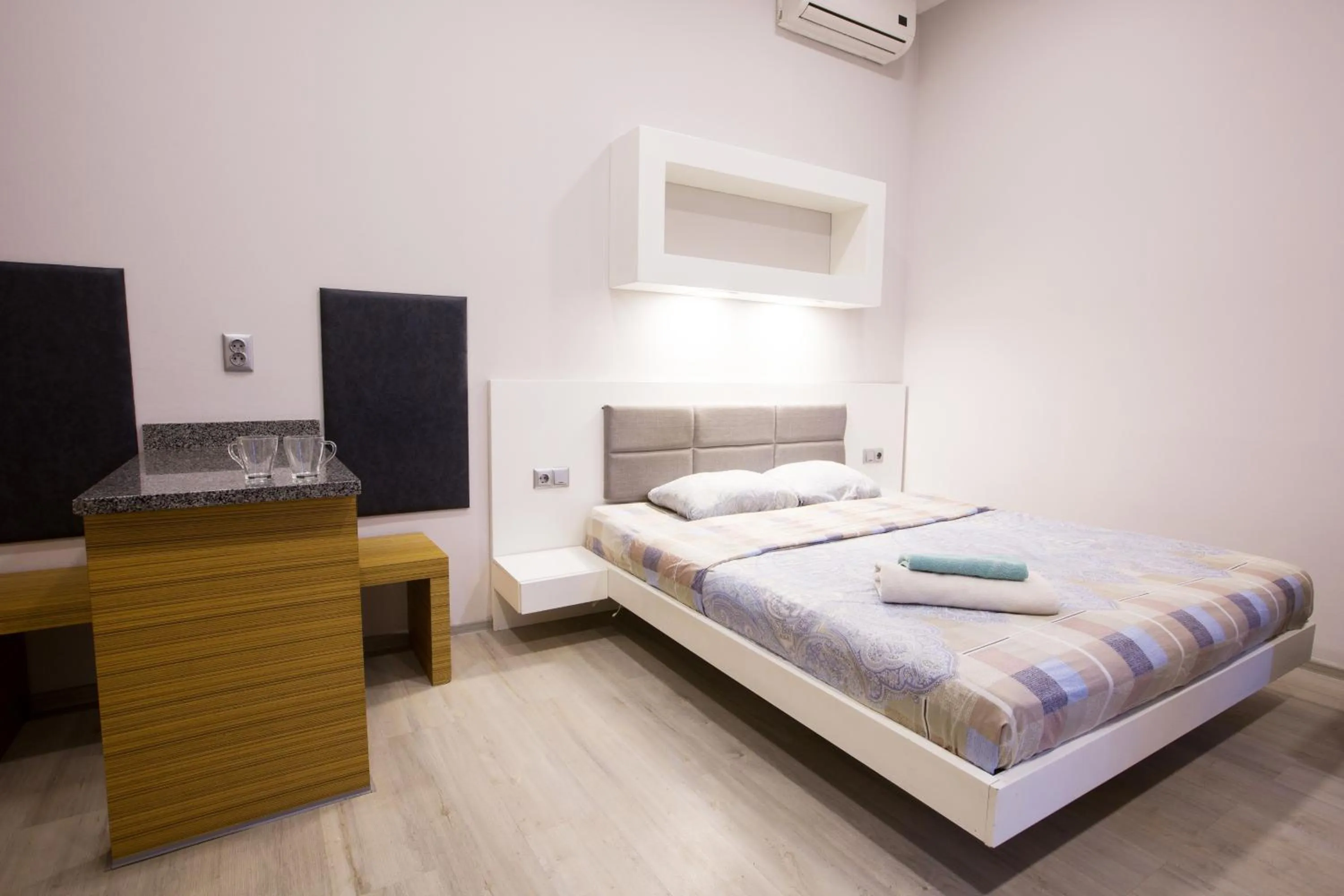 Photo of the whole room, Bed in Pushkinskaya Apartments