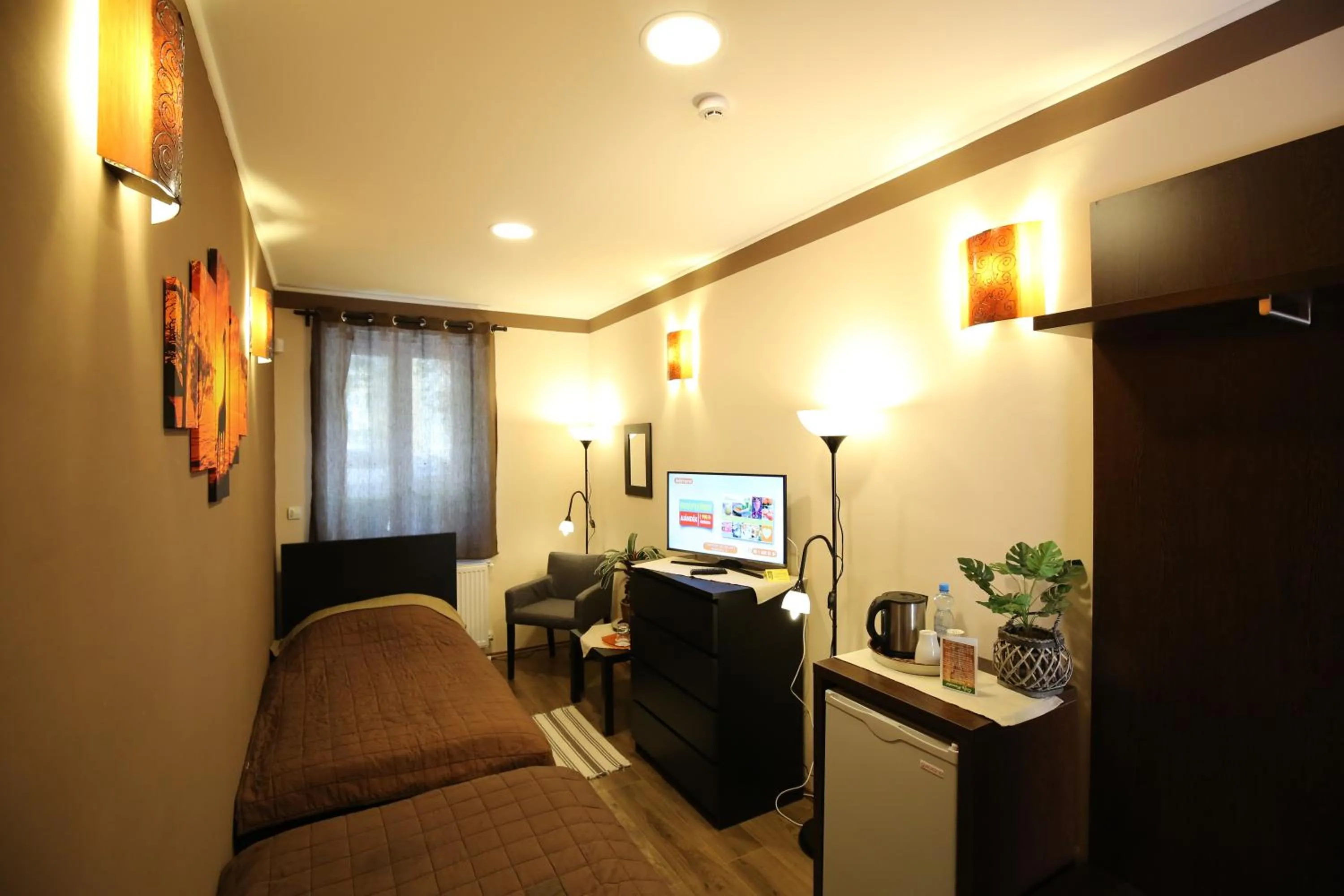 Bed in Napraforgó Wellness Ház és Panzió