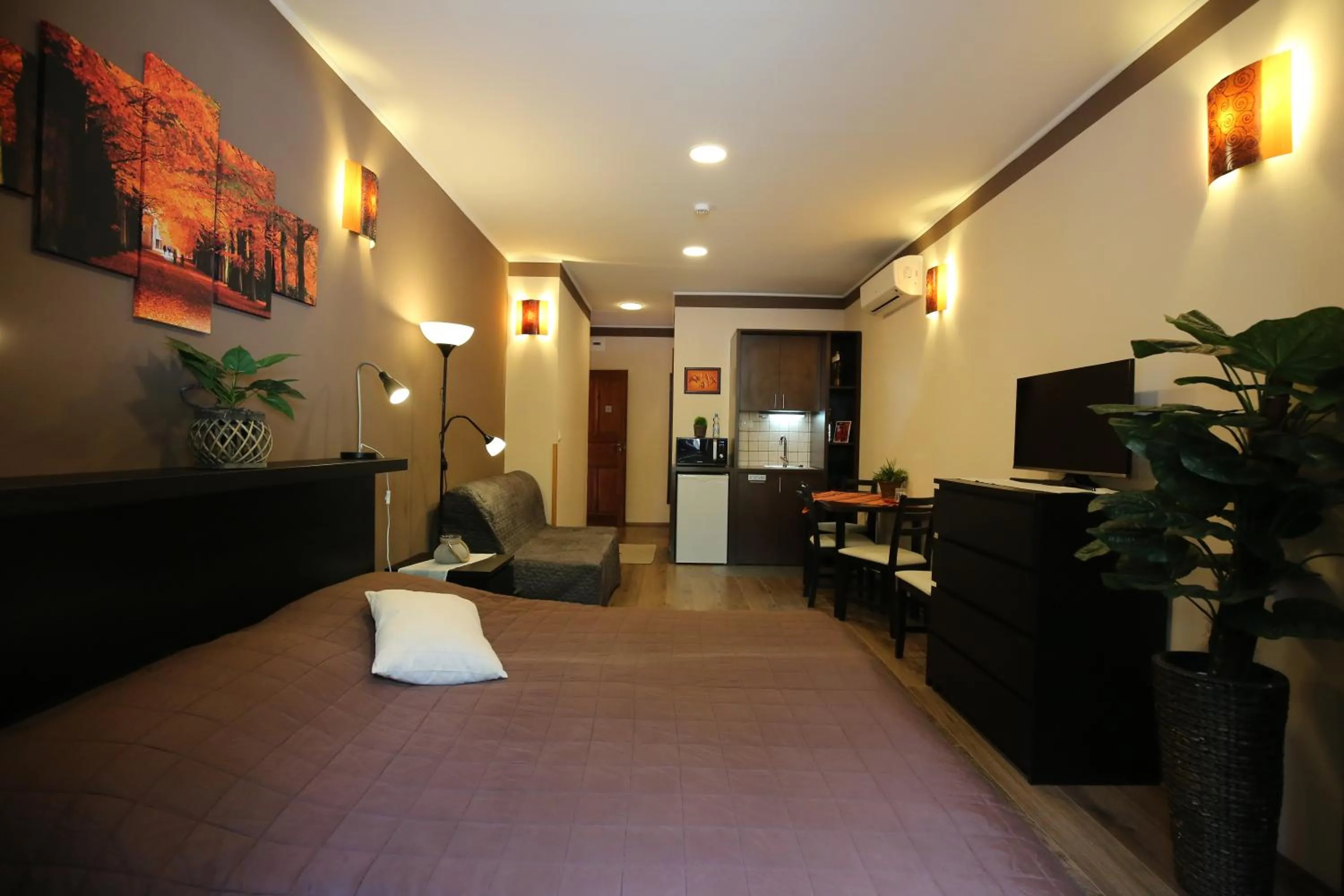 Bed in Napraforgó Wellness Ház és Panzió