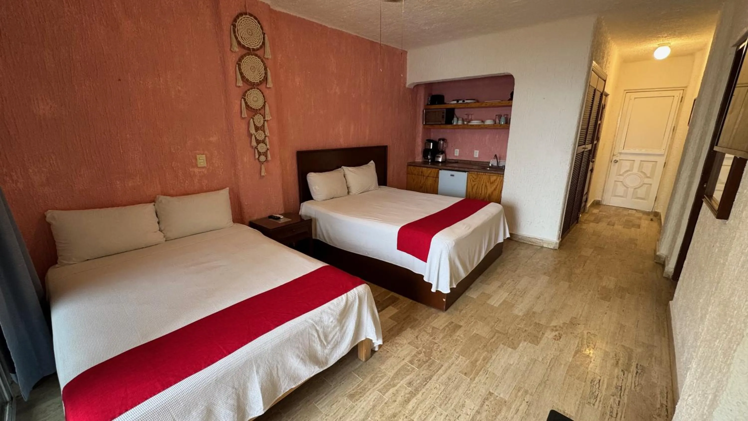 Bed in Cancún Plaza Sea View