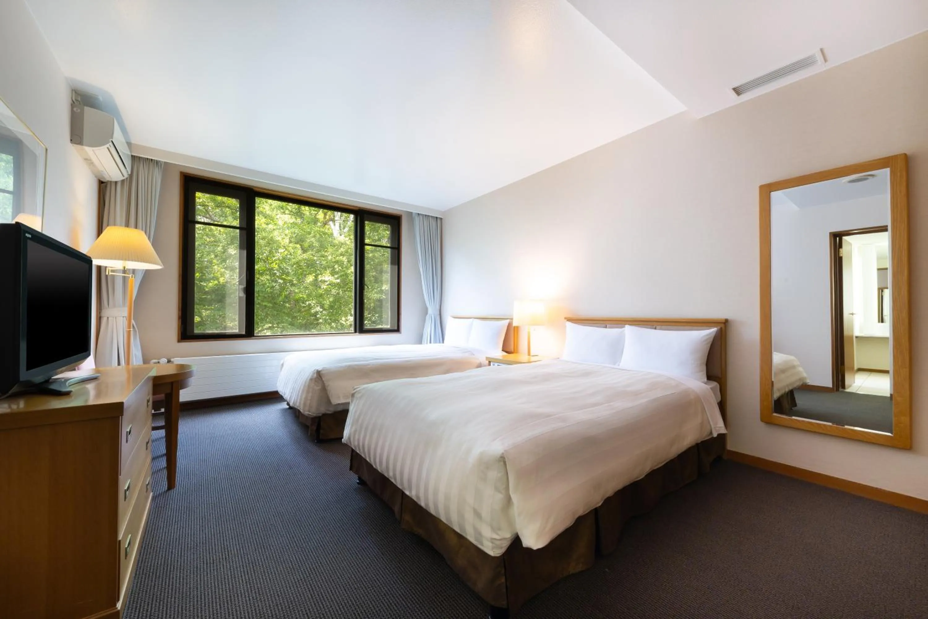 Bed in Yatsugatake Kogen Lodge