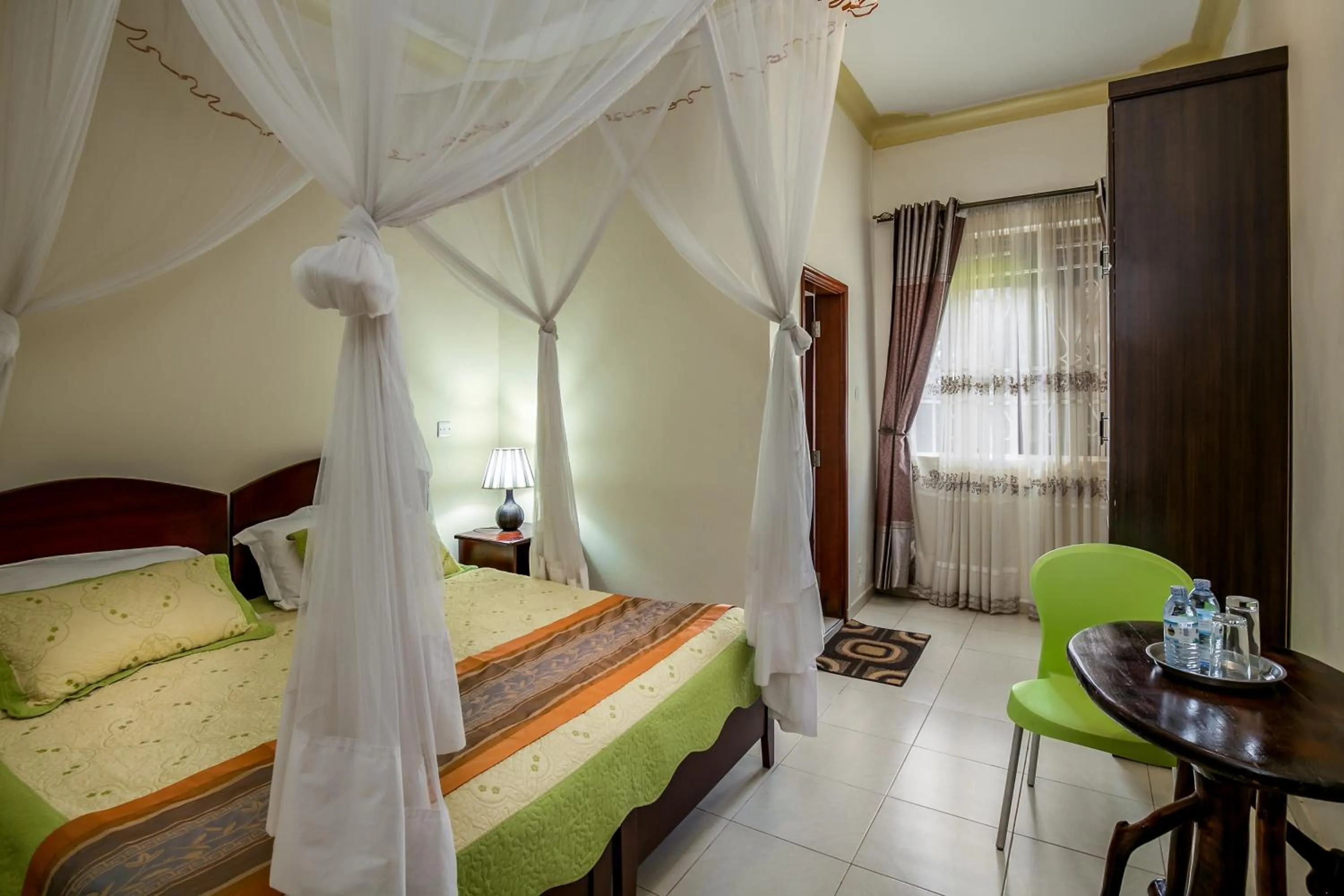 Bedroom, Bed in The Crested Crane Bwindi Hotel