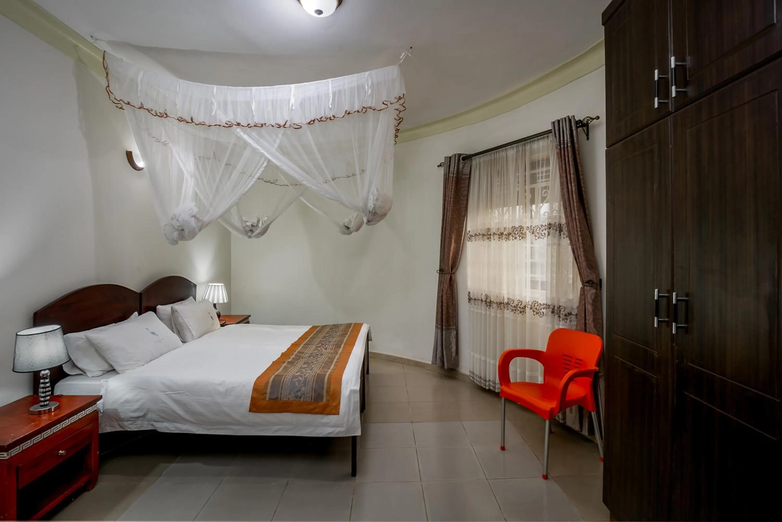 Bedroom, Bed in The Crested Crane Bwindi Hotel