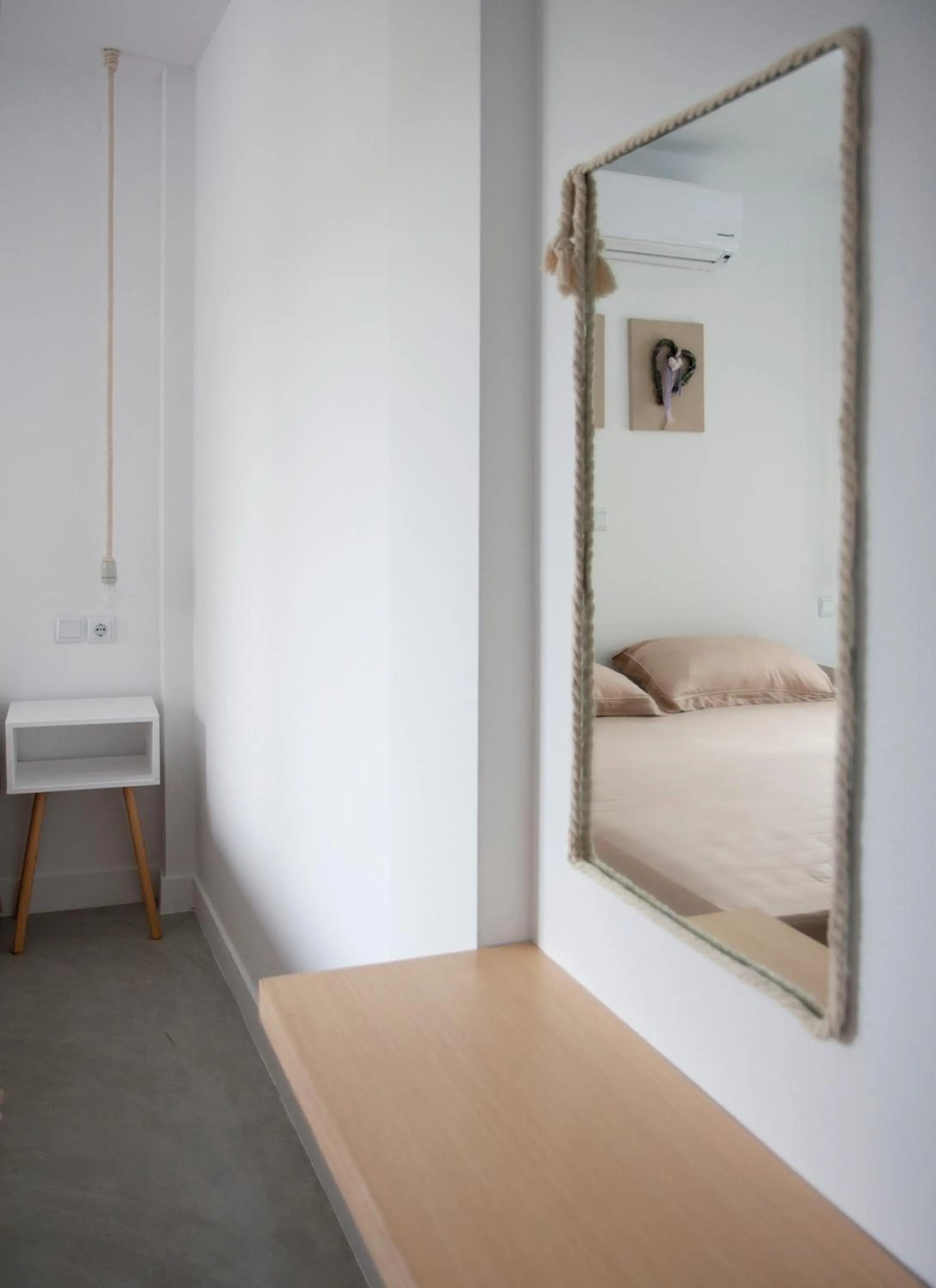 Decorative detail, Bed in Axos Apartments