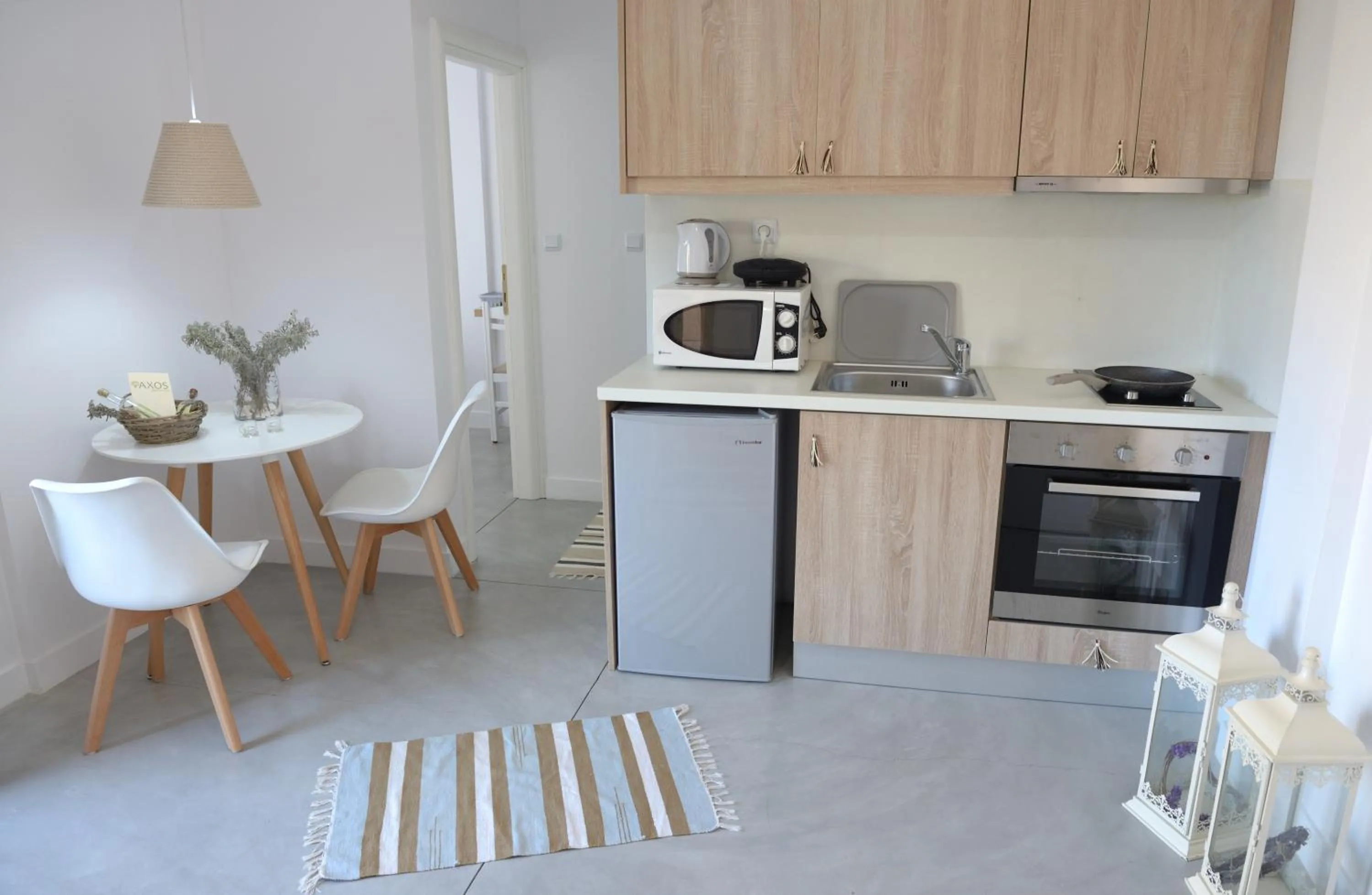 Kitchen or kitchenette in Axos Apartments