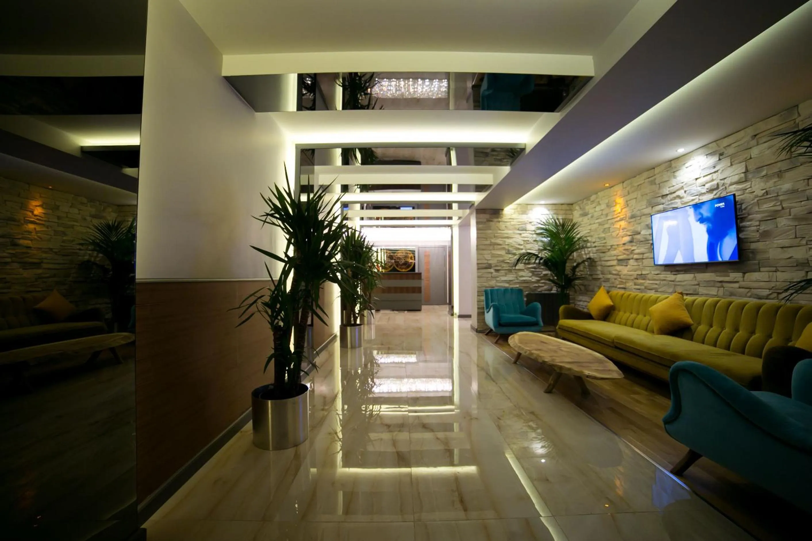 Communal lounge/ TV room in Ankacity Suit Flat