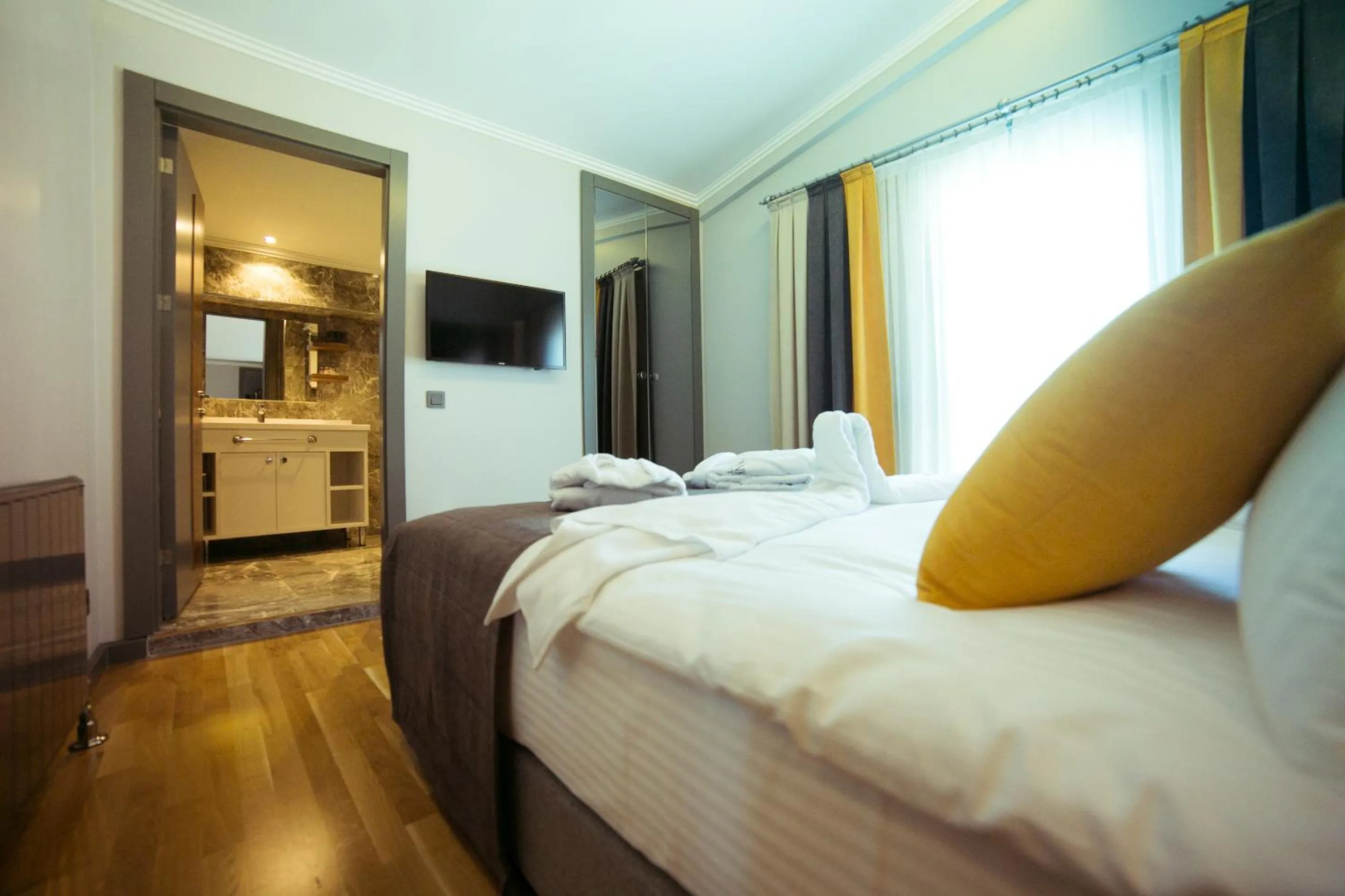 Photo of the whole room, Bed in Ankacity Suit Flat