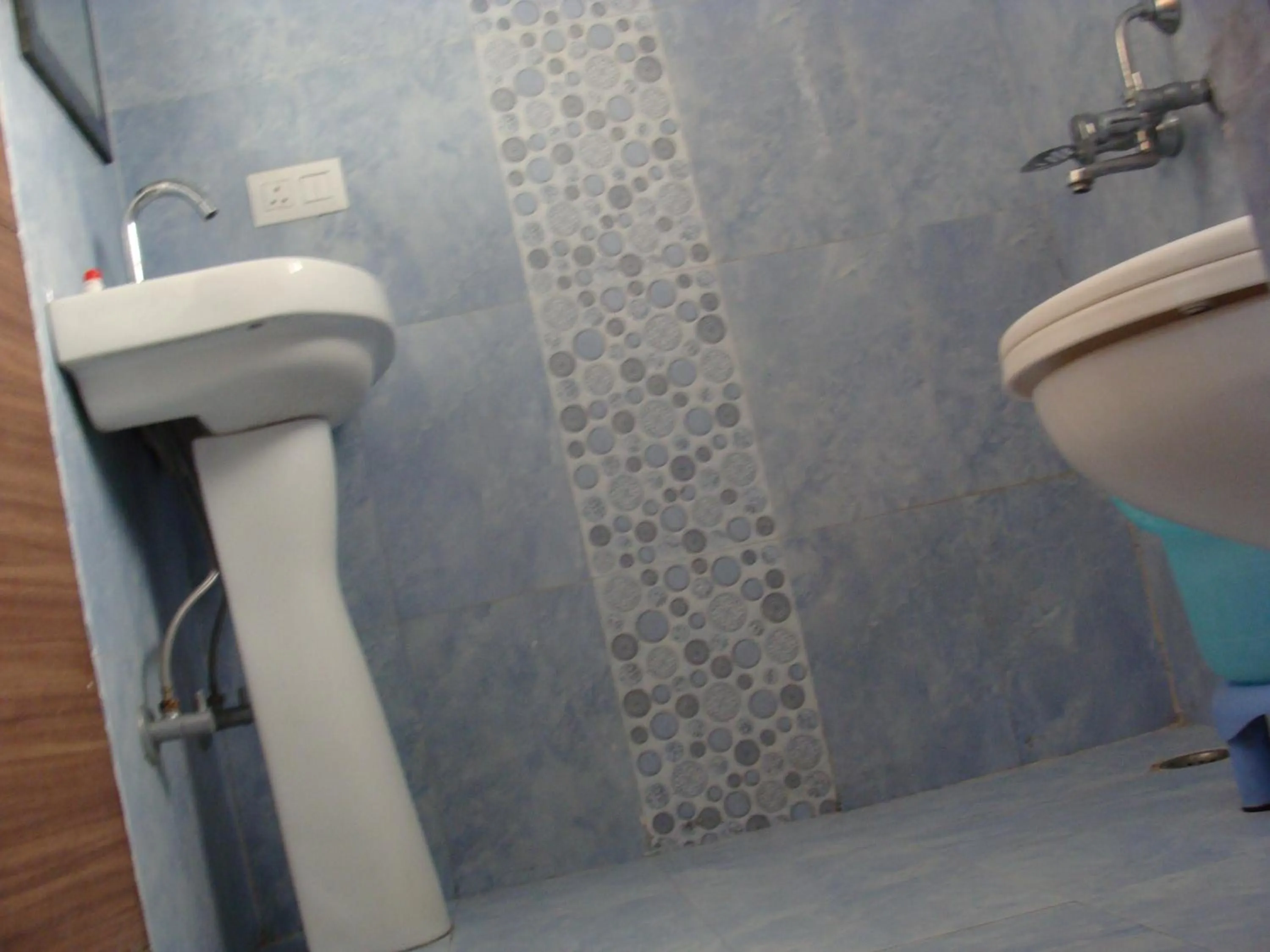 Toilet in Hotel Abhinandan Grand