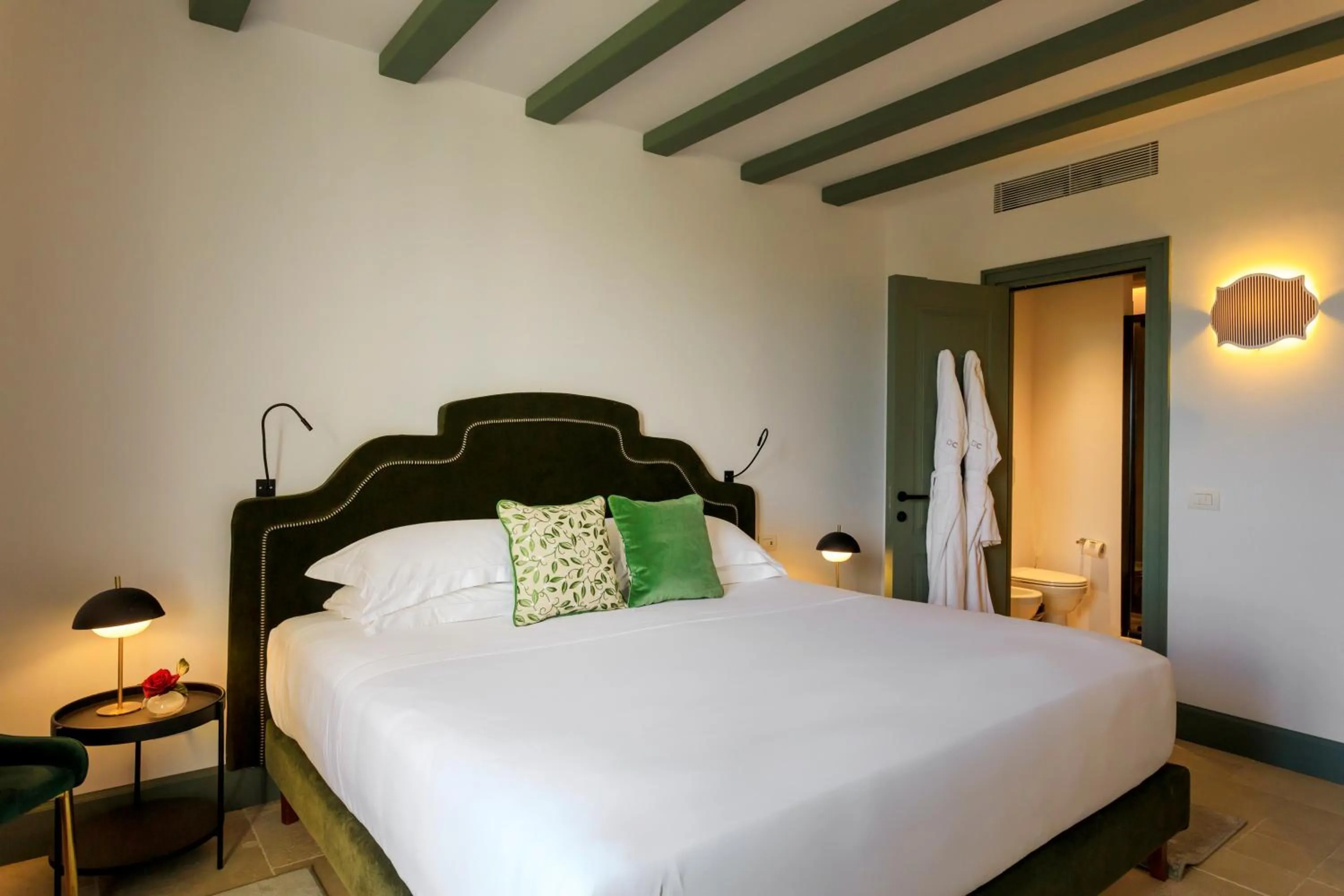 Bed in Donna Carmela Resort & Lodges