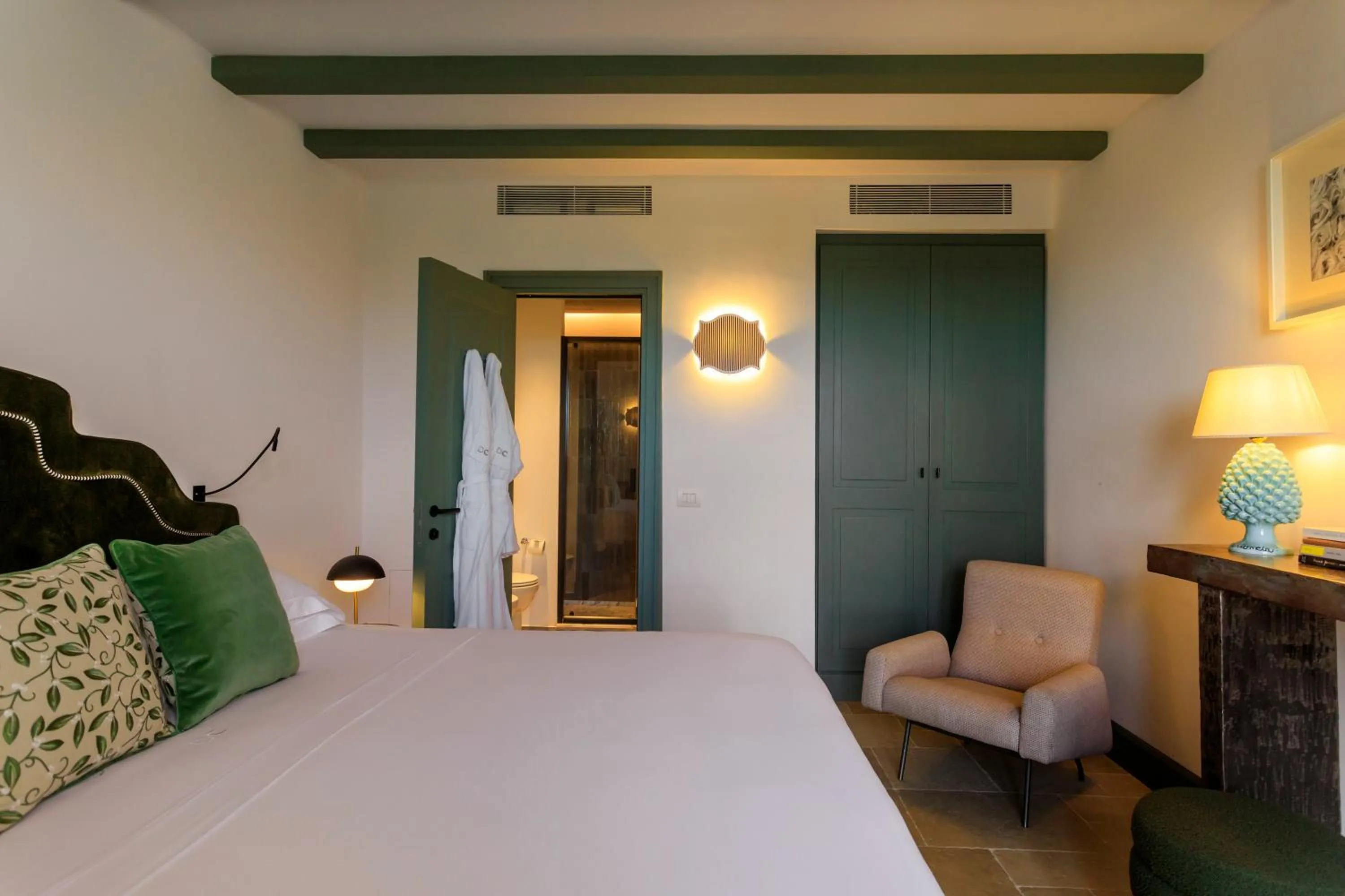 Bed in Donna Carmela Resort & Lodges