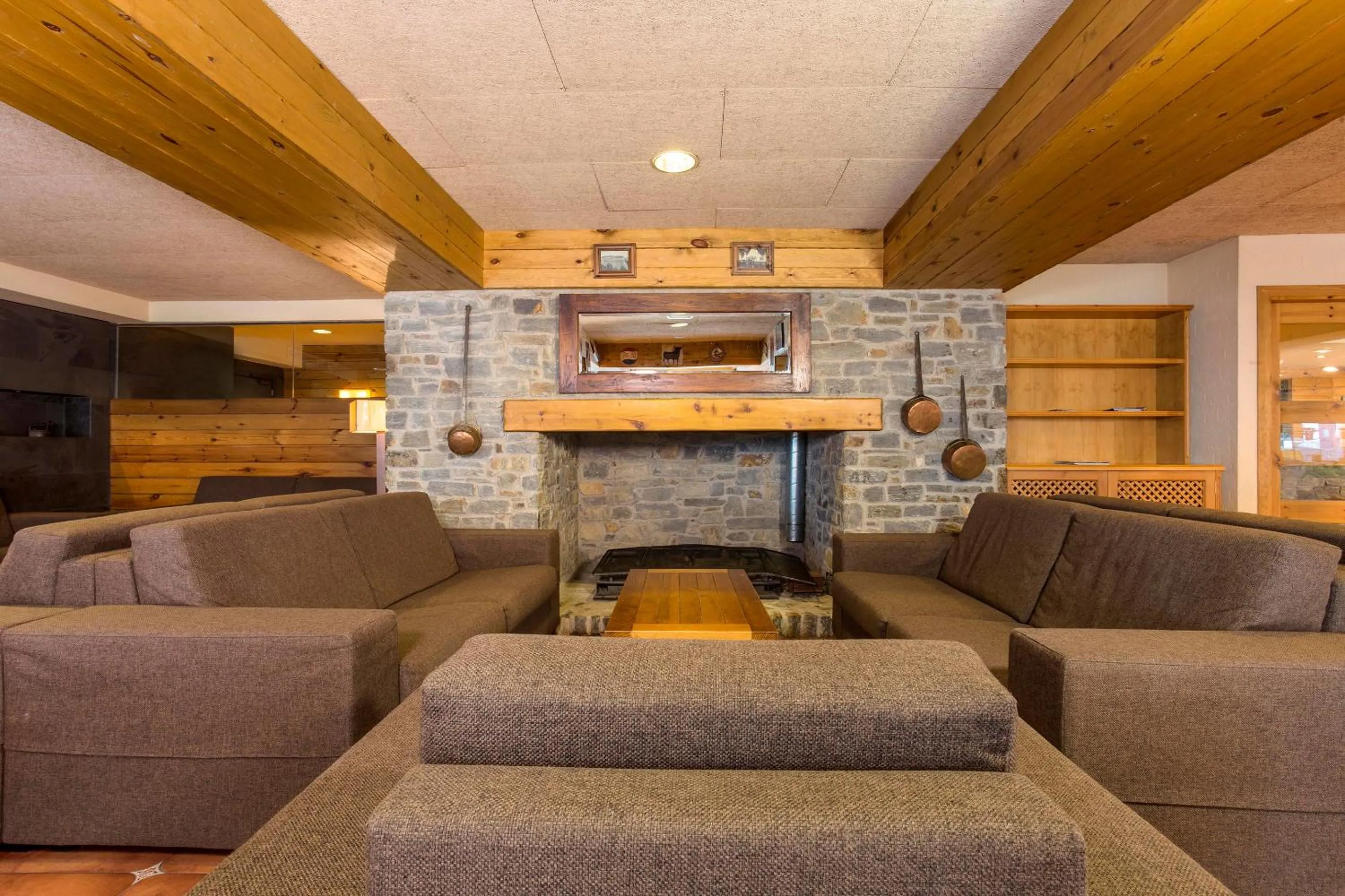 Living room in Hotel Màgic Pas by Nexta