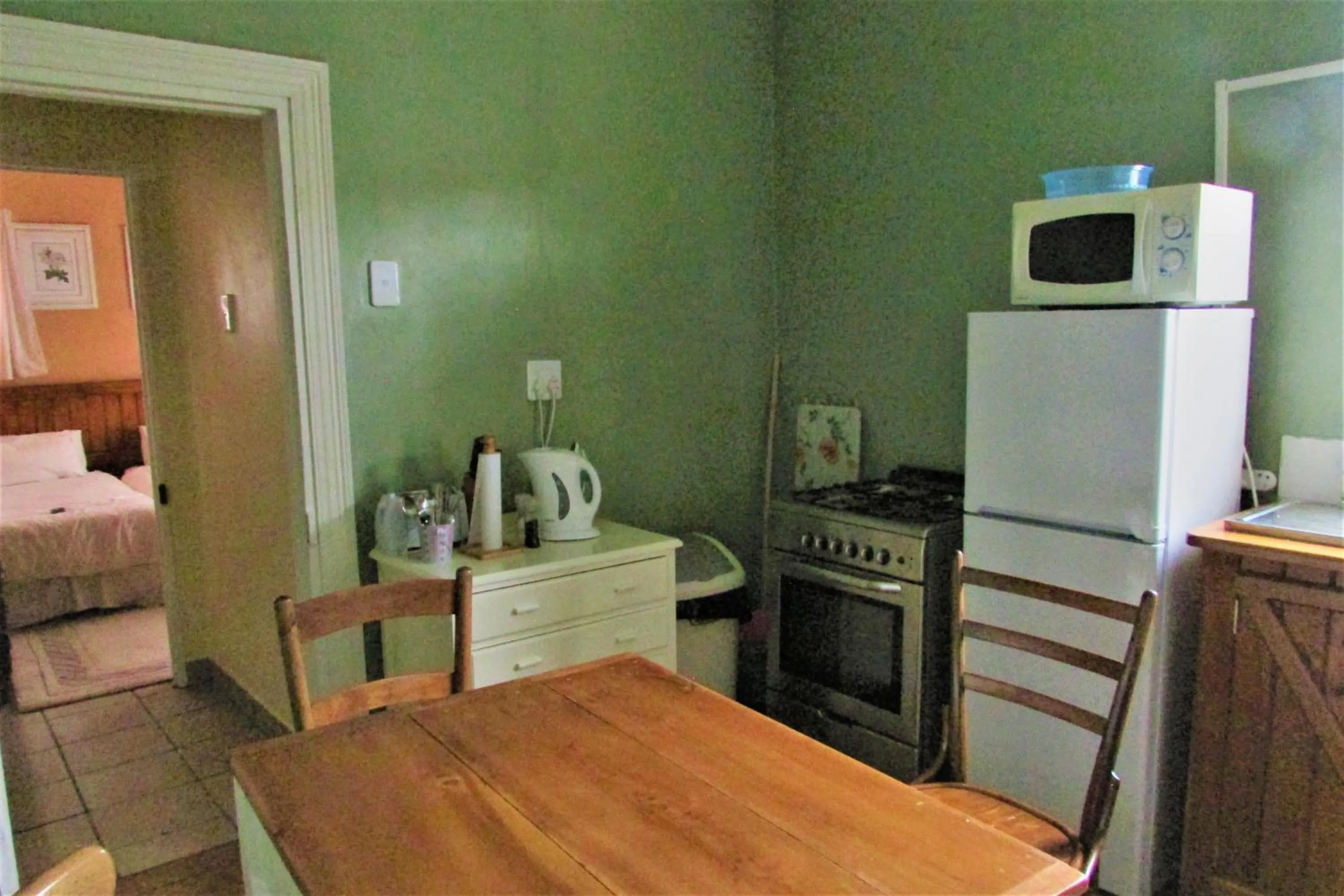 Kitchen or kitchenette in Absolute Leisure Cottages