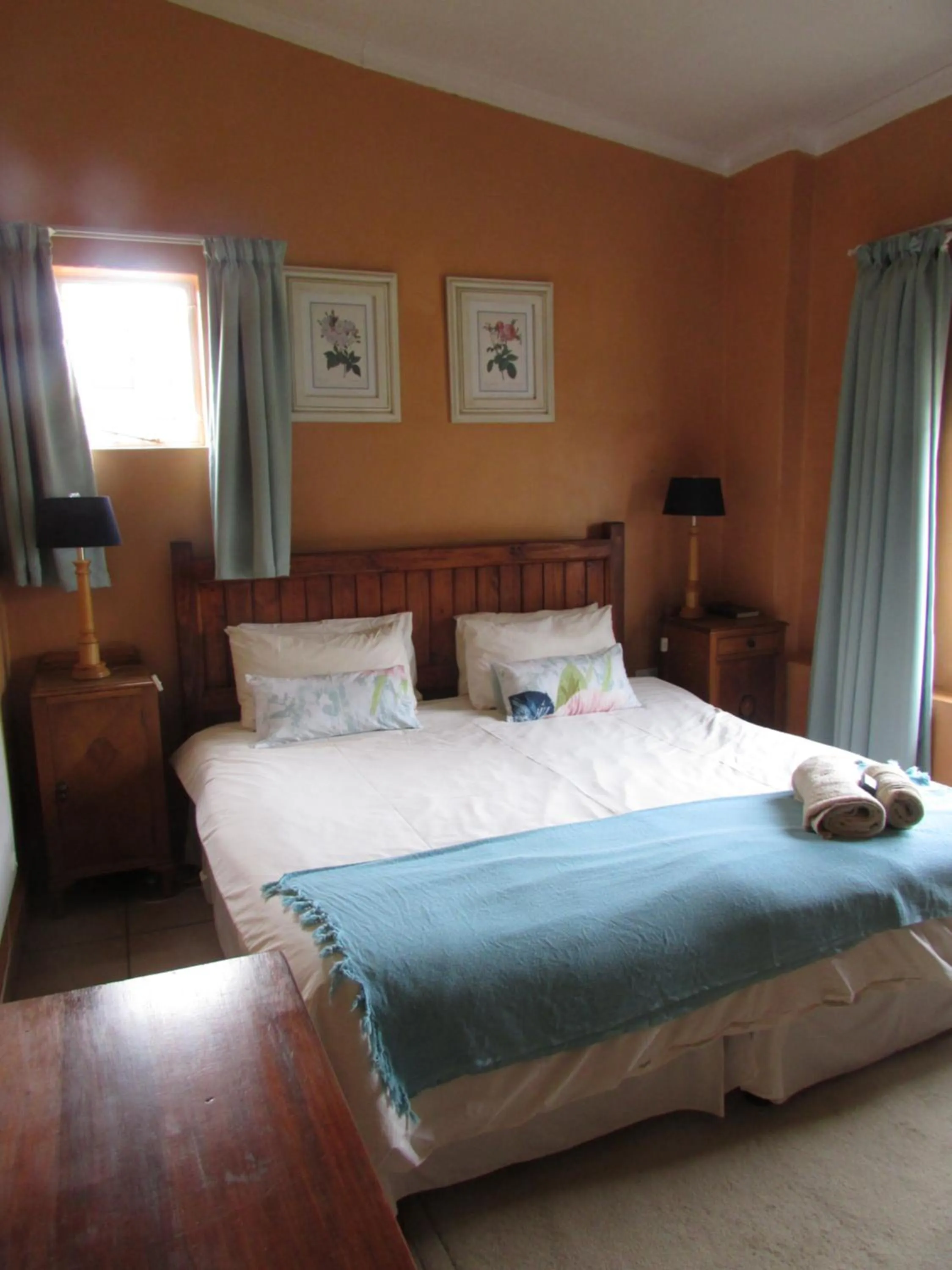 Bedroom, Bed in Absolute Leisure Cottages