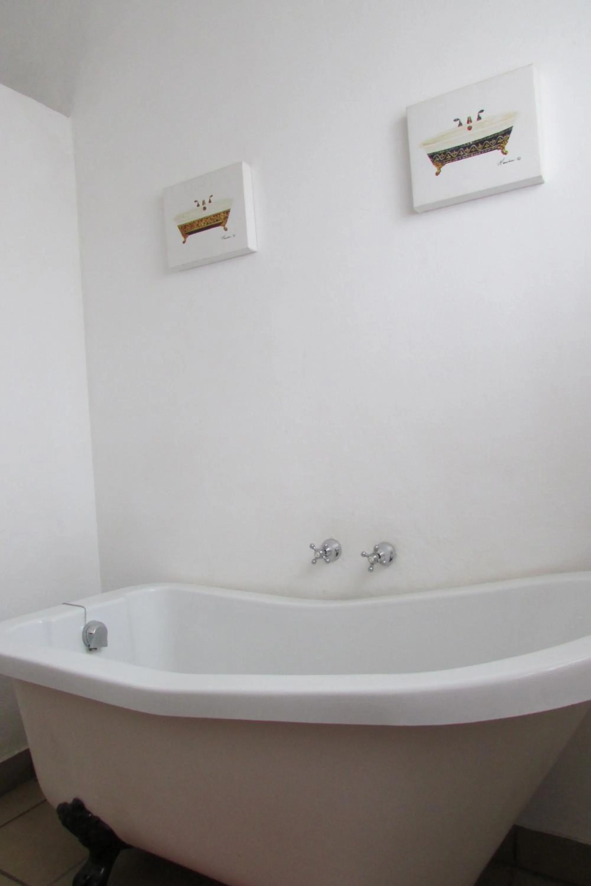 Bathroom in Absolute Leisure Cottages