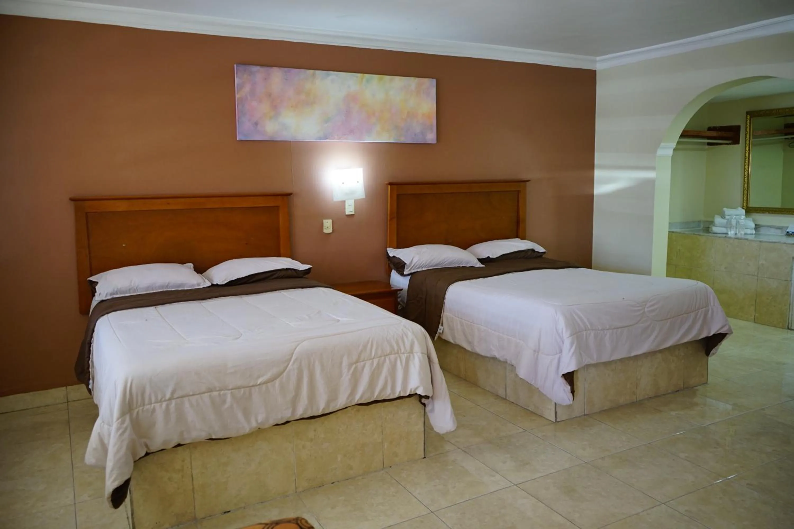 Bed in Hotel Posada del Sol Inn