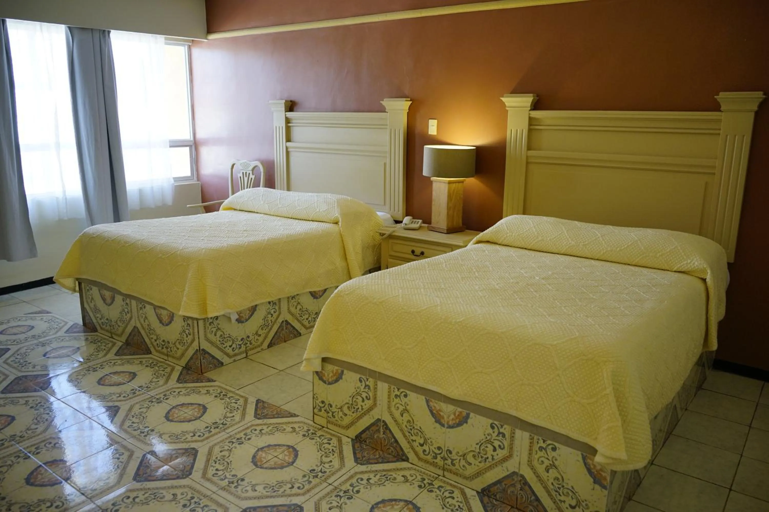 Bed in Hotel Posada del Sol Inn