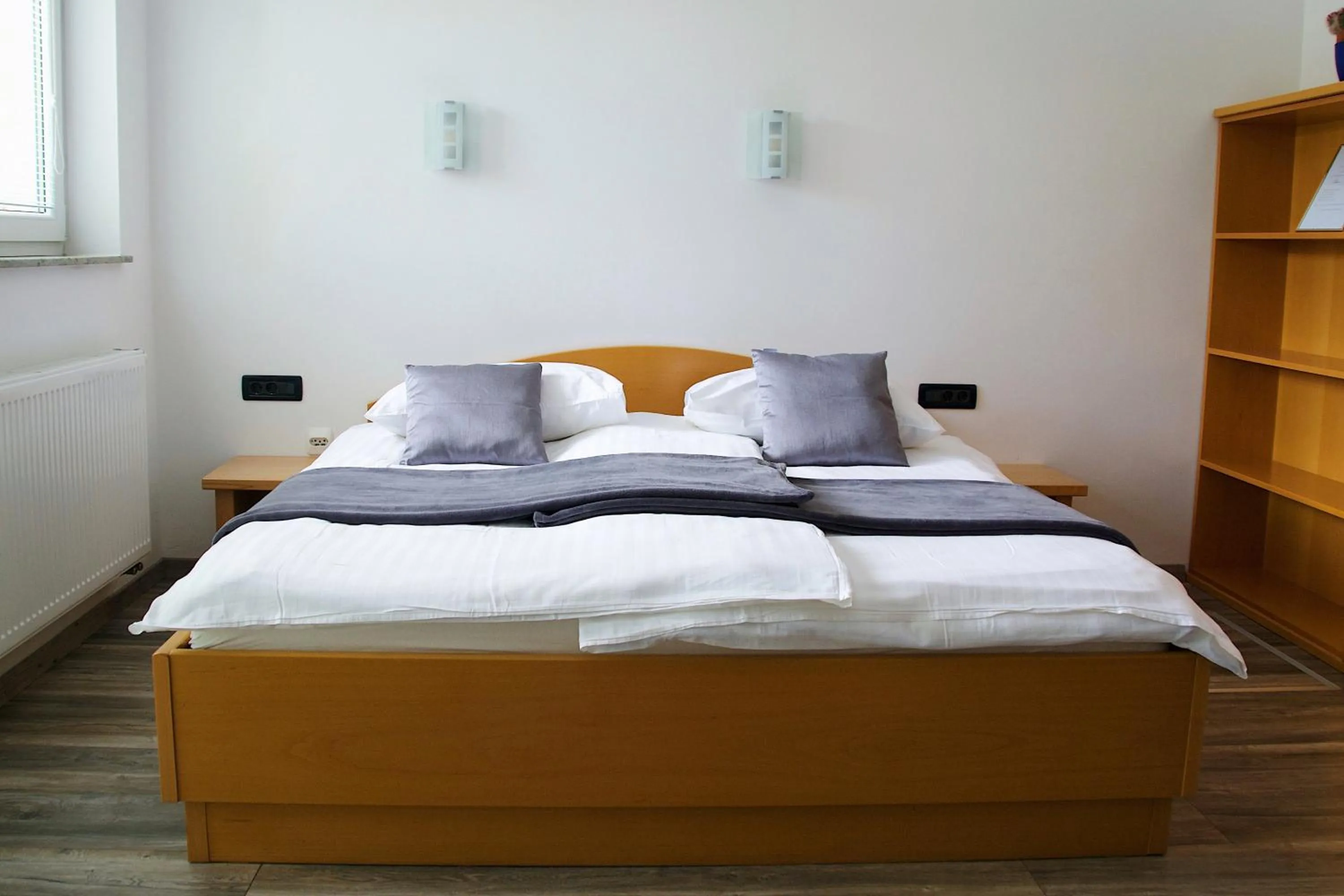 Bed in Rudi Hiti's Guest House