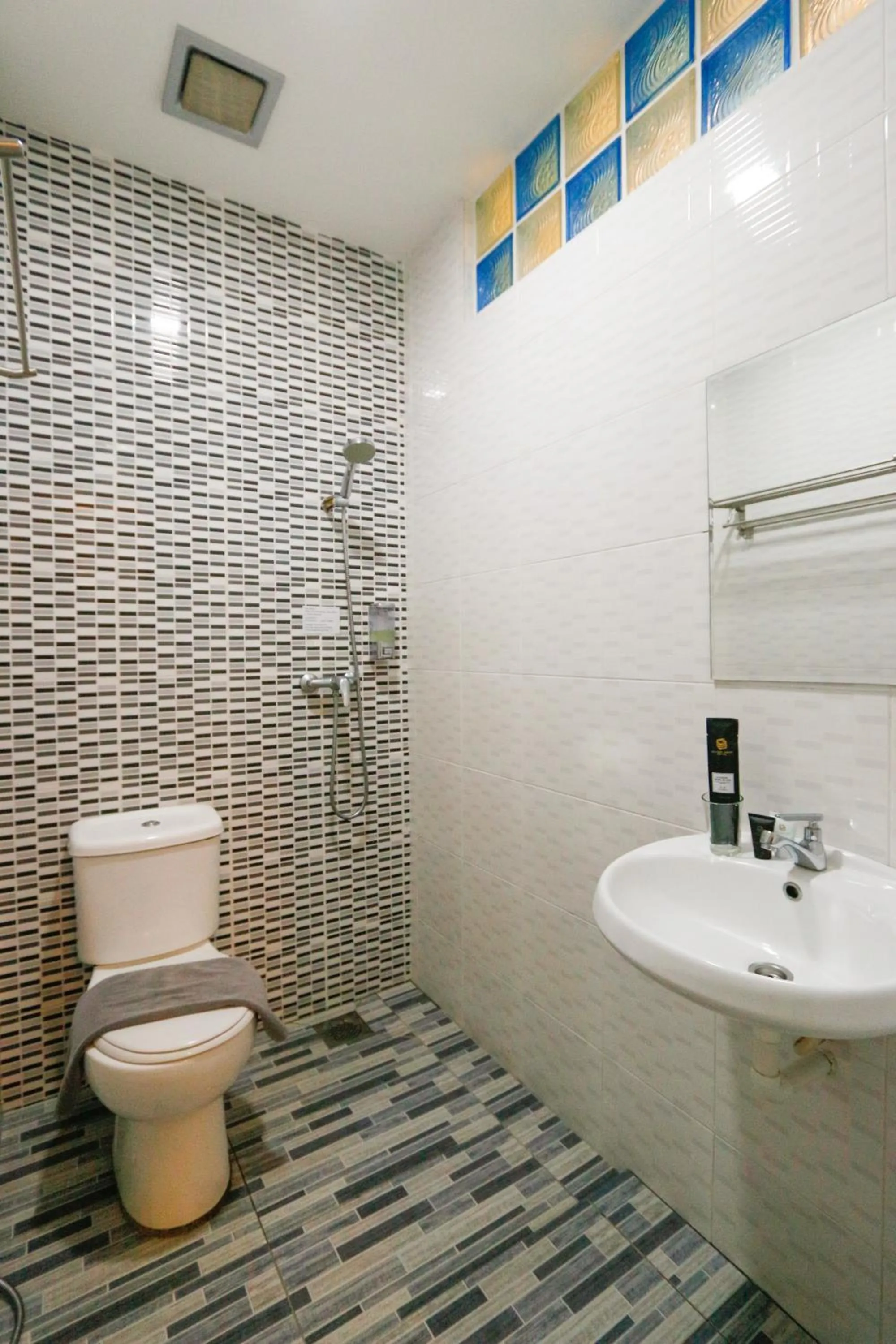 Shower in Travelland Hotel