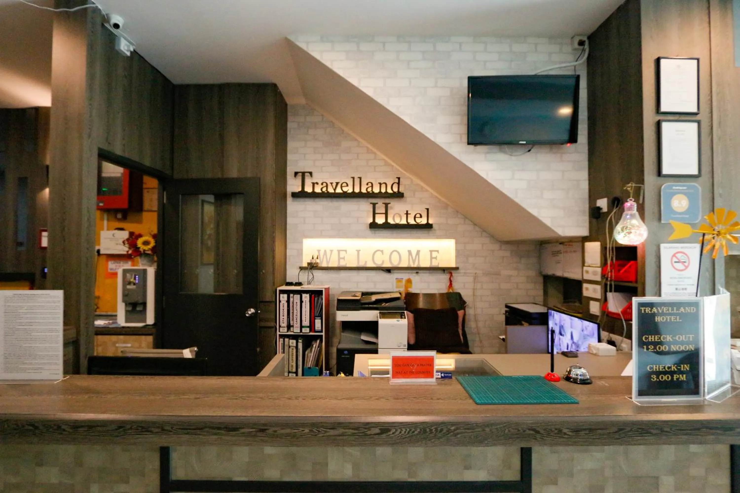 Lobby or reception in Travelland Hotel