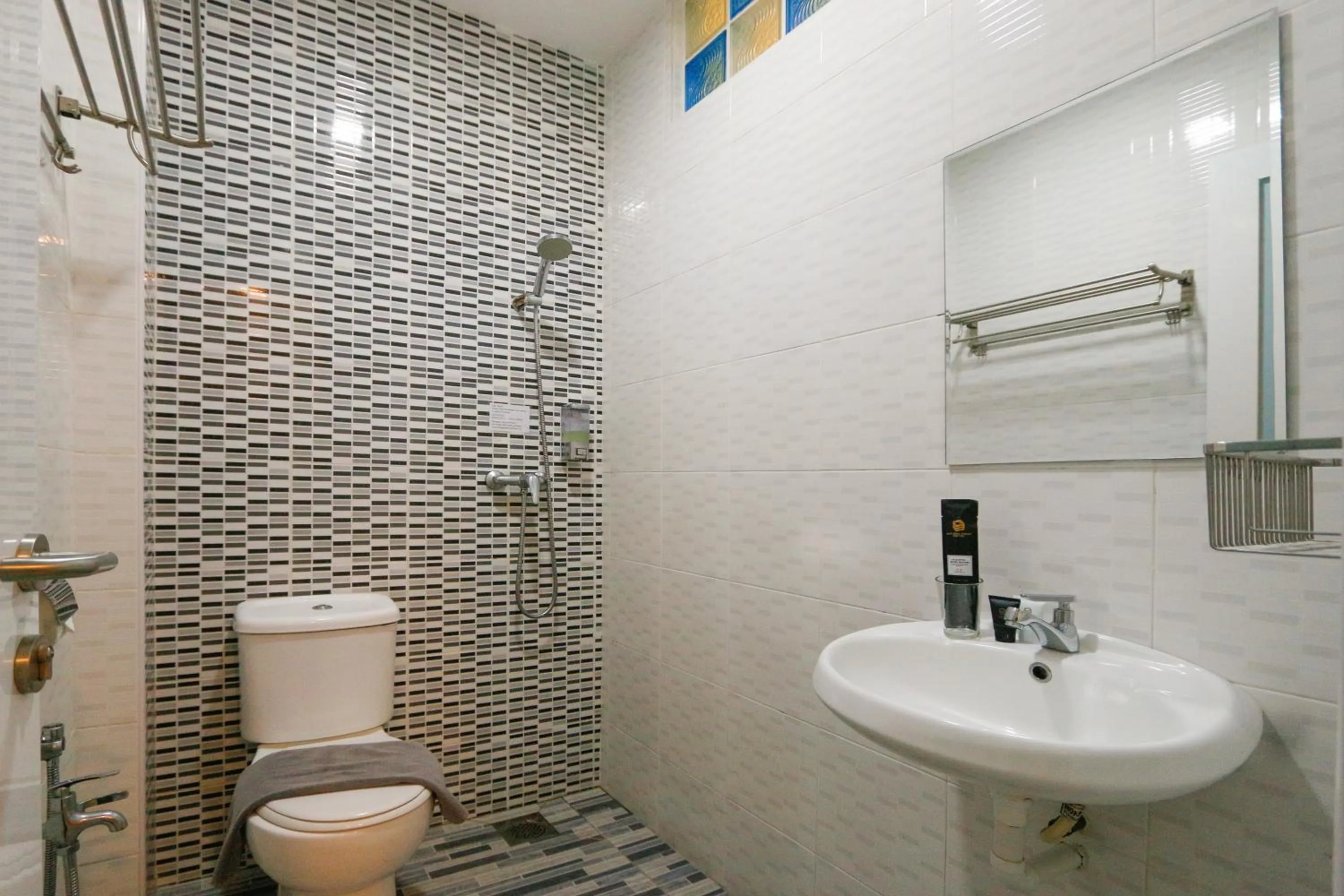 Shower in Travelland Hotel