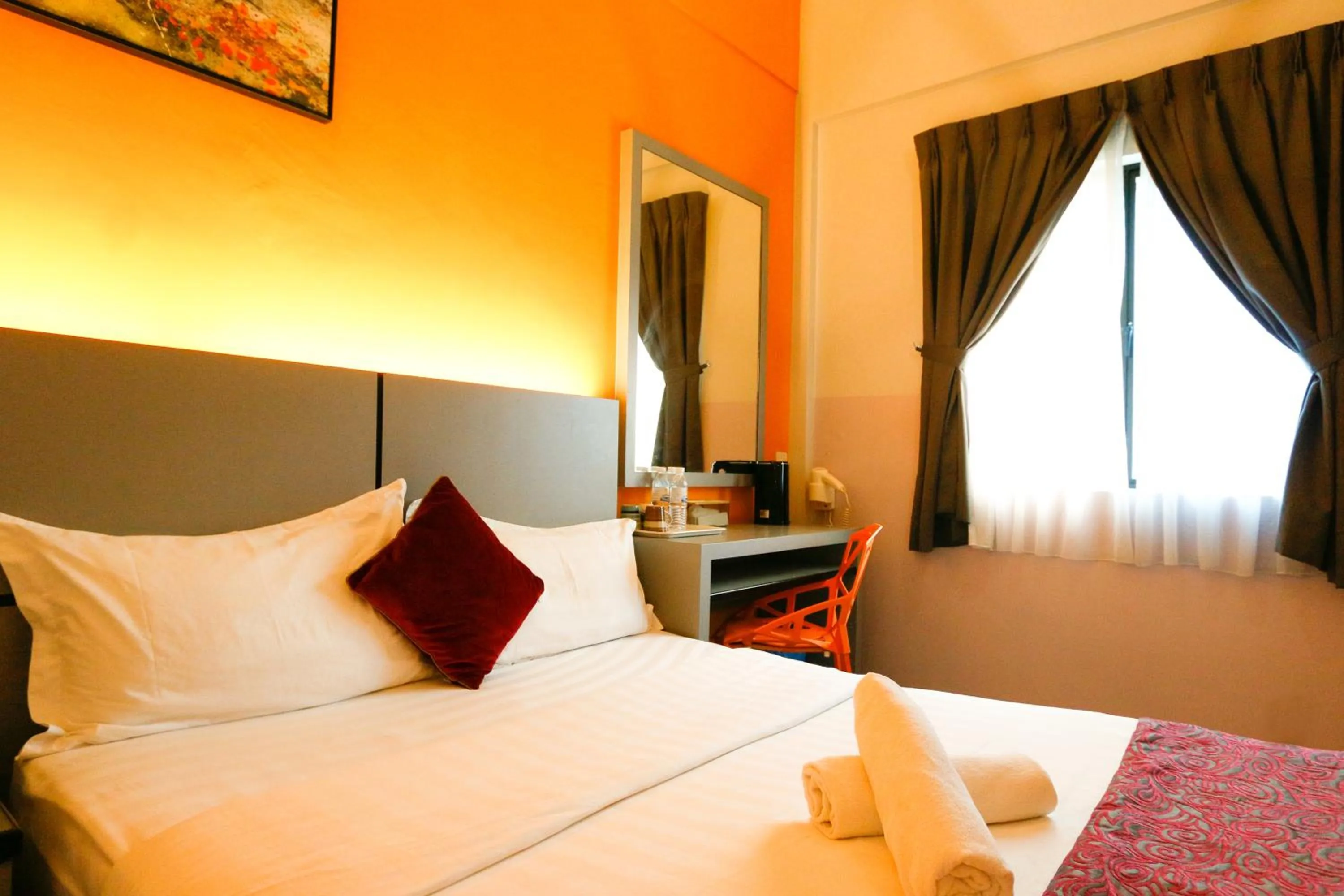 Bed in Travelland Hotel