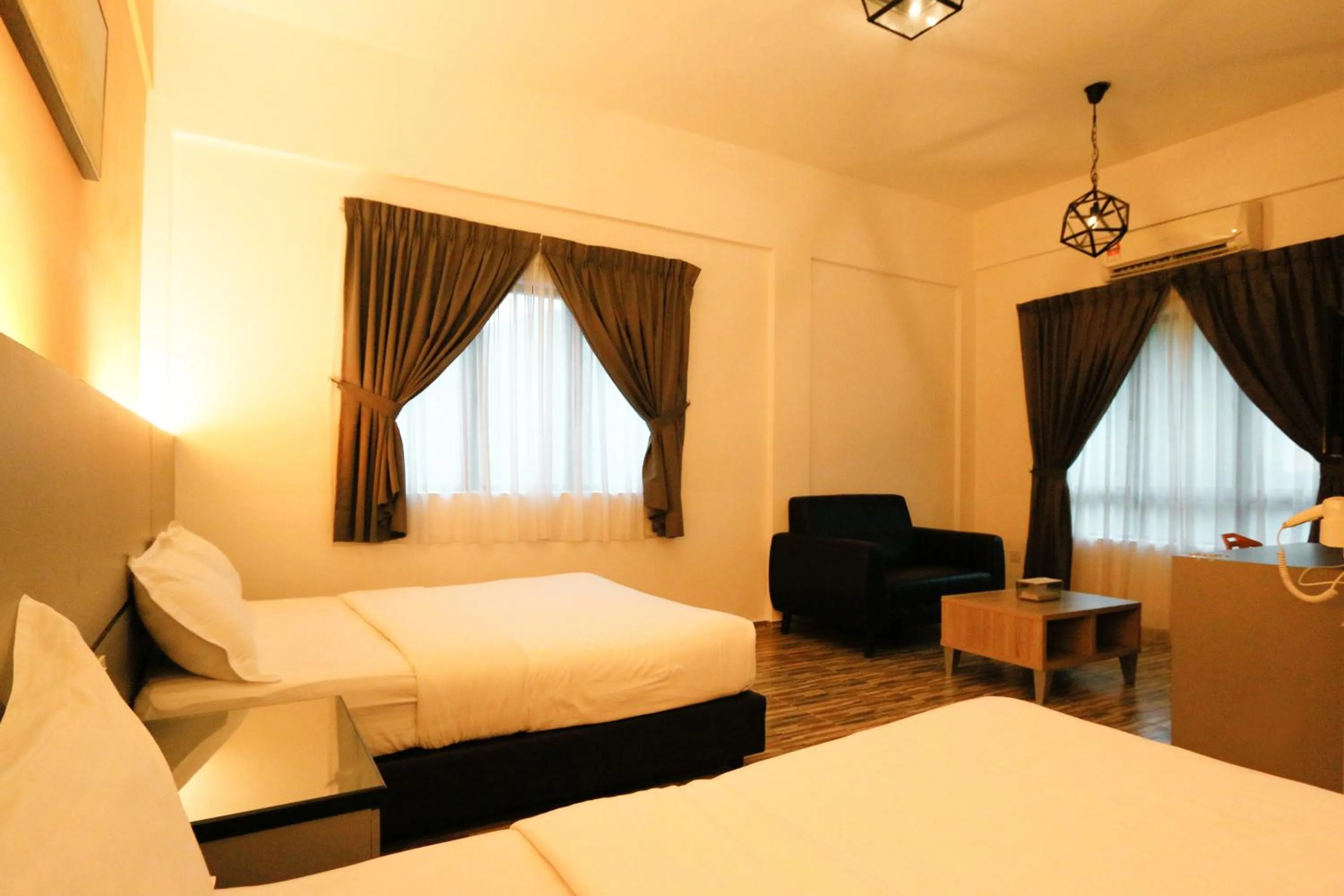 Bed in Travelland Hotel