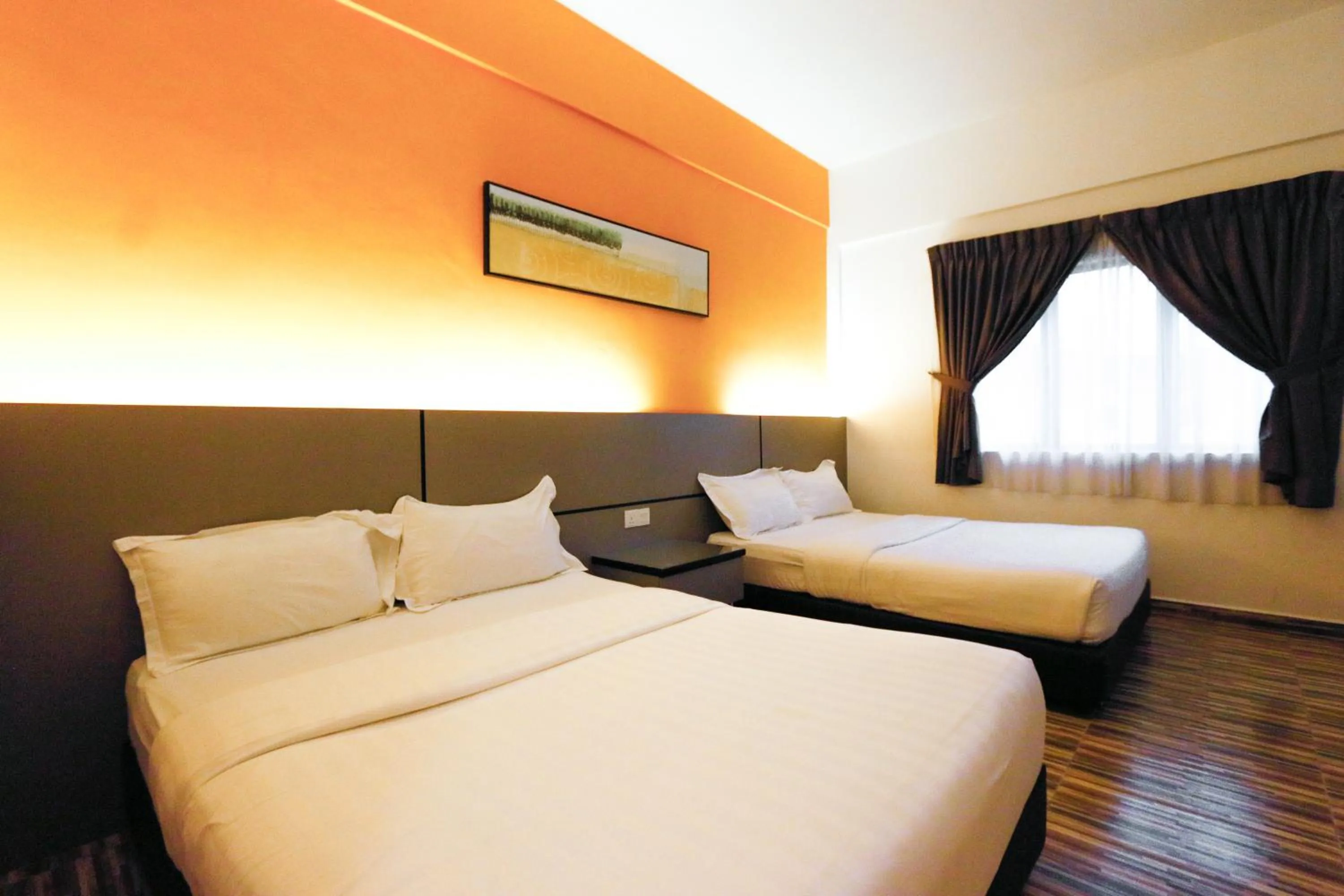 Bed in Travelland Hotel