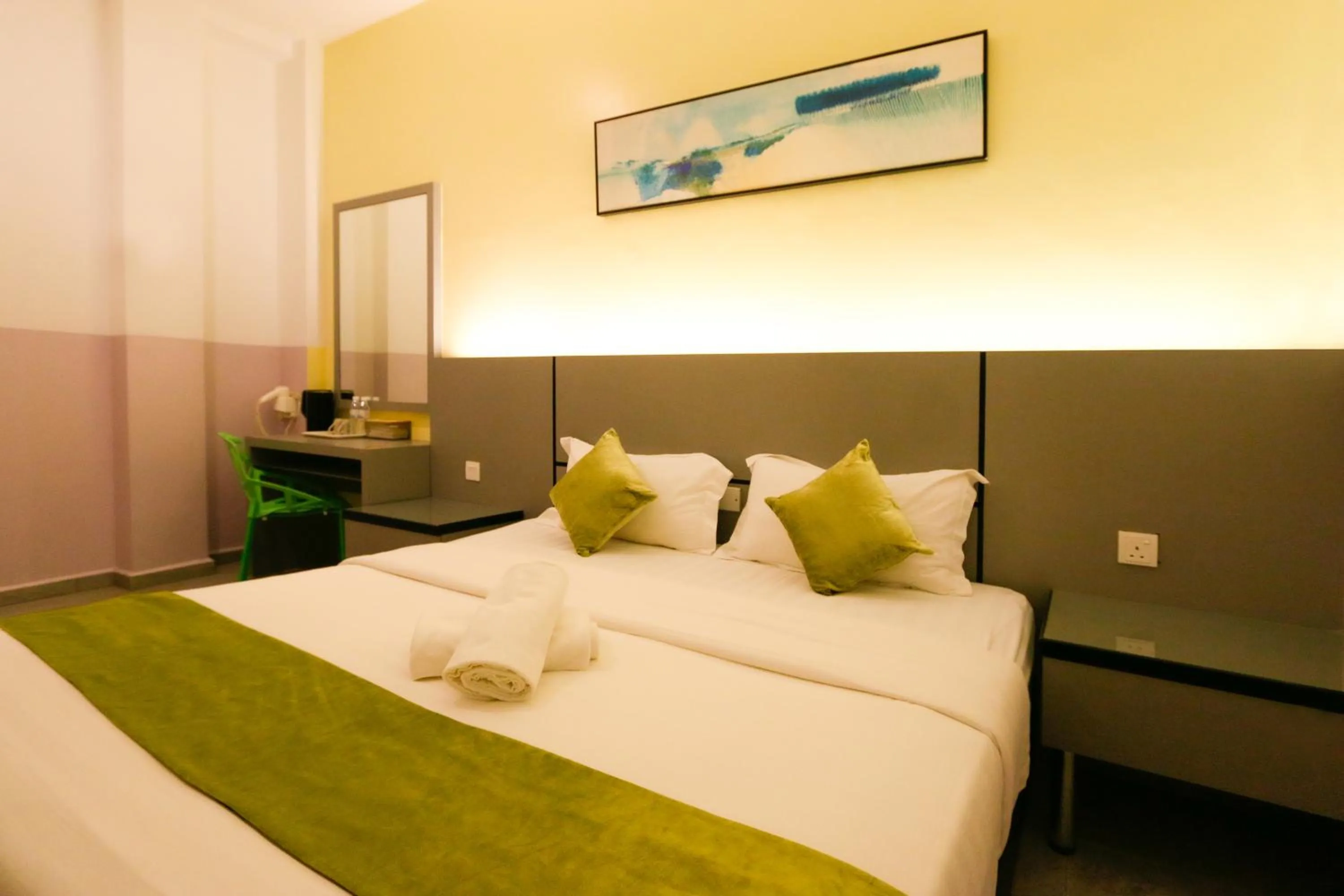 Bed in Travelland Hotel