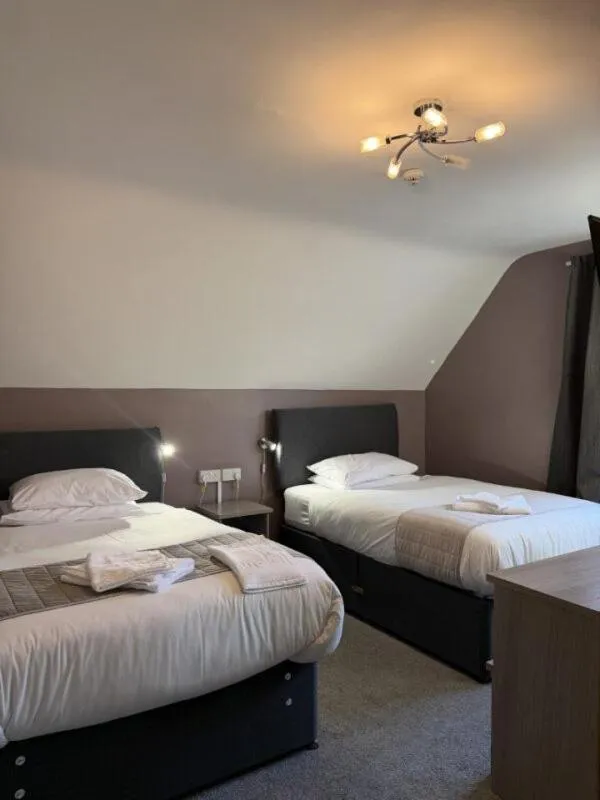 Bedroom, Bed in The Avenue Hotel